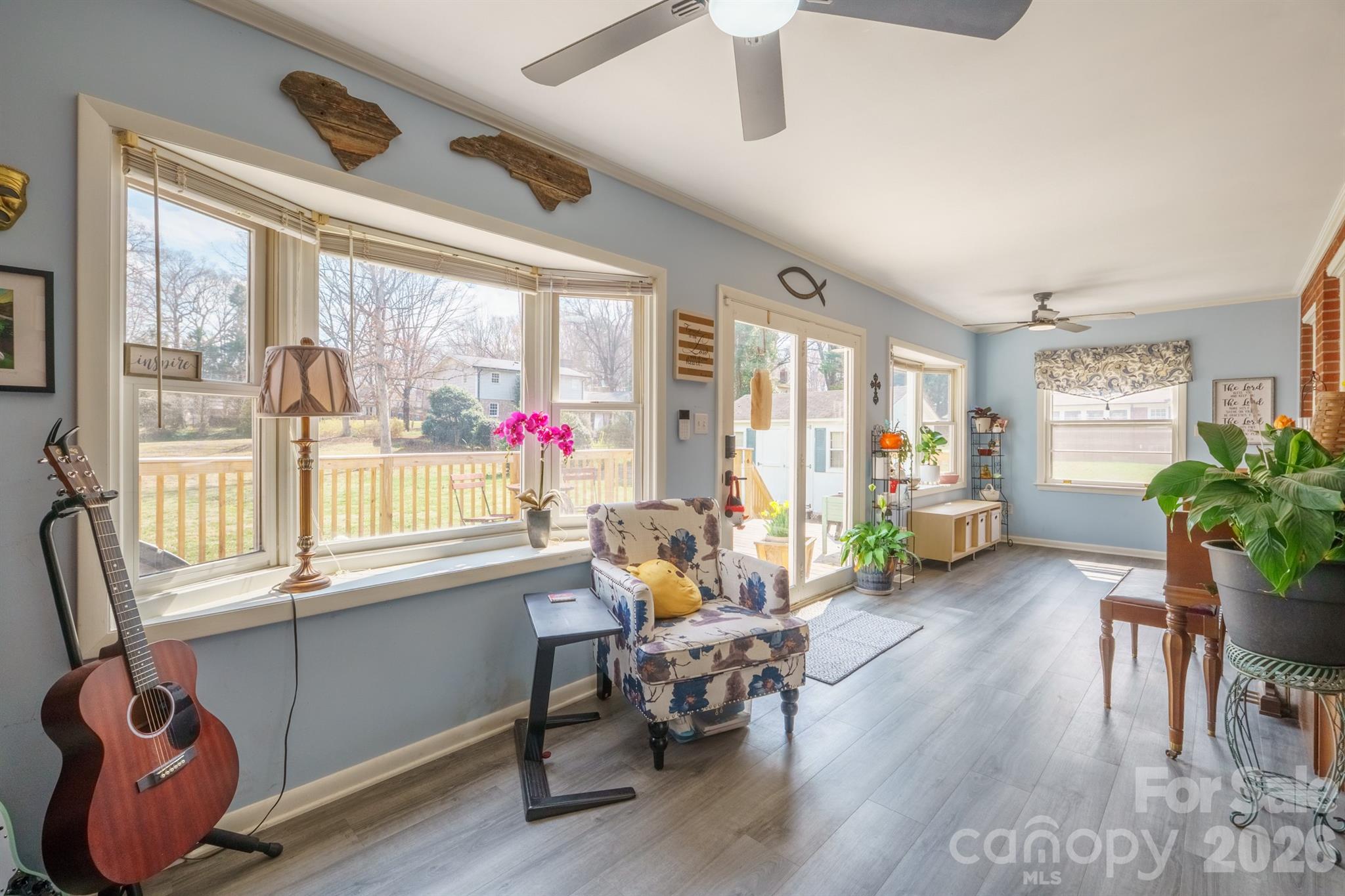 712 2nd Avenue Northwest Conover, NC 28613 - Photo 16 of 33 a living room with furniture and a large window