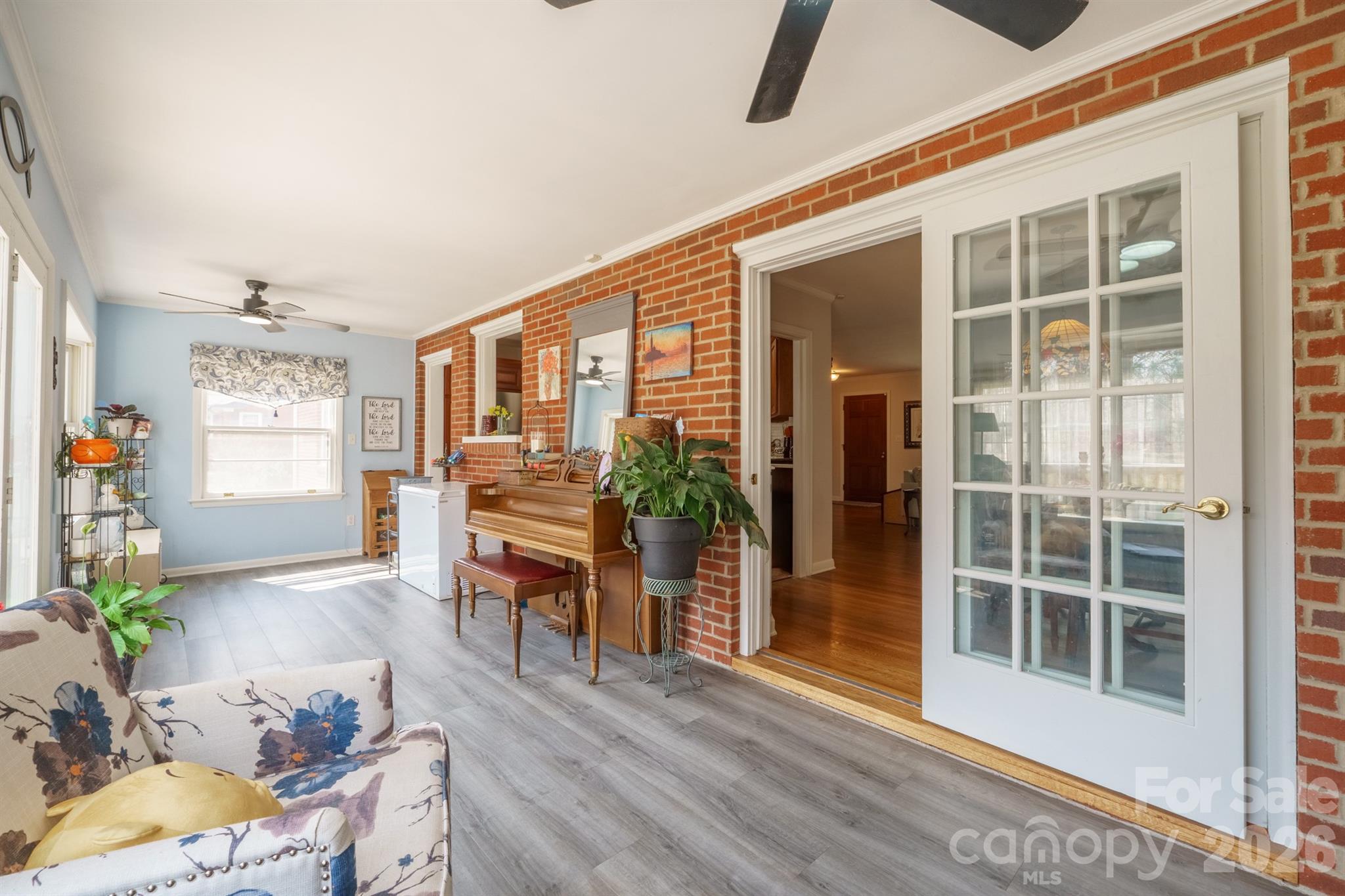 712 2nd Avenue Northwest Conover, NC 28613 - Photo 17 of 33 a living room with furniture and windows