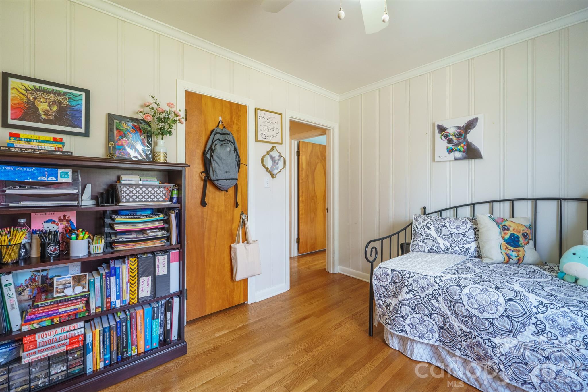 712 2nd Avenue Northwest Conover, NC 28613 - Photo 24 of 33 a bedroom with a bed and a book shelf