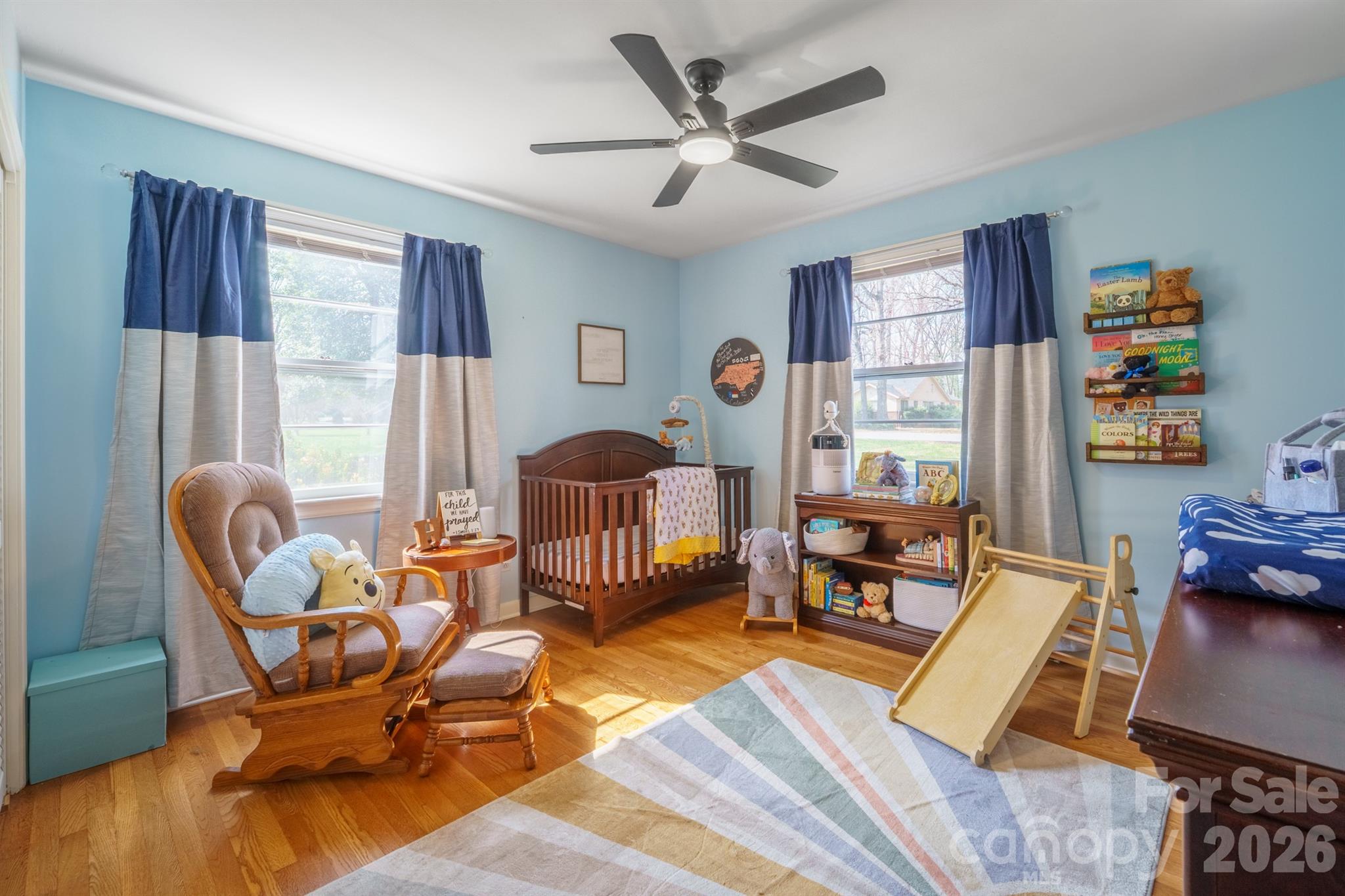 712 2nd Avenue Northwest Conover, NC 28613 - Photo 25 of 33 a living room with furniture and wooden floor