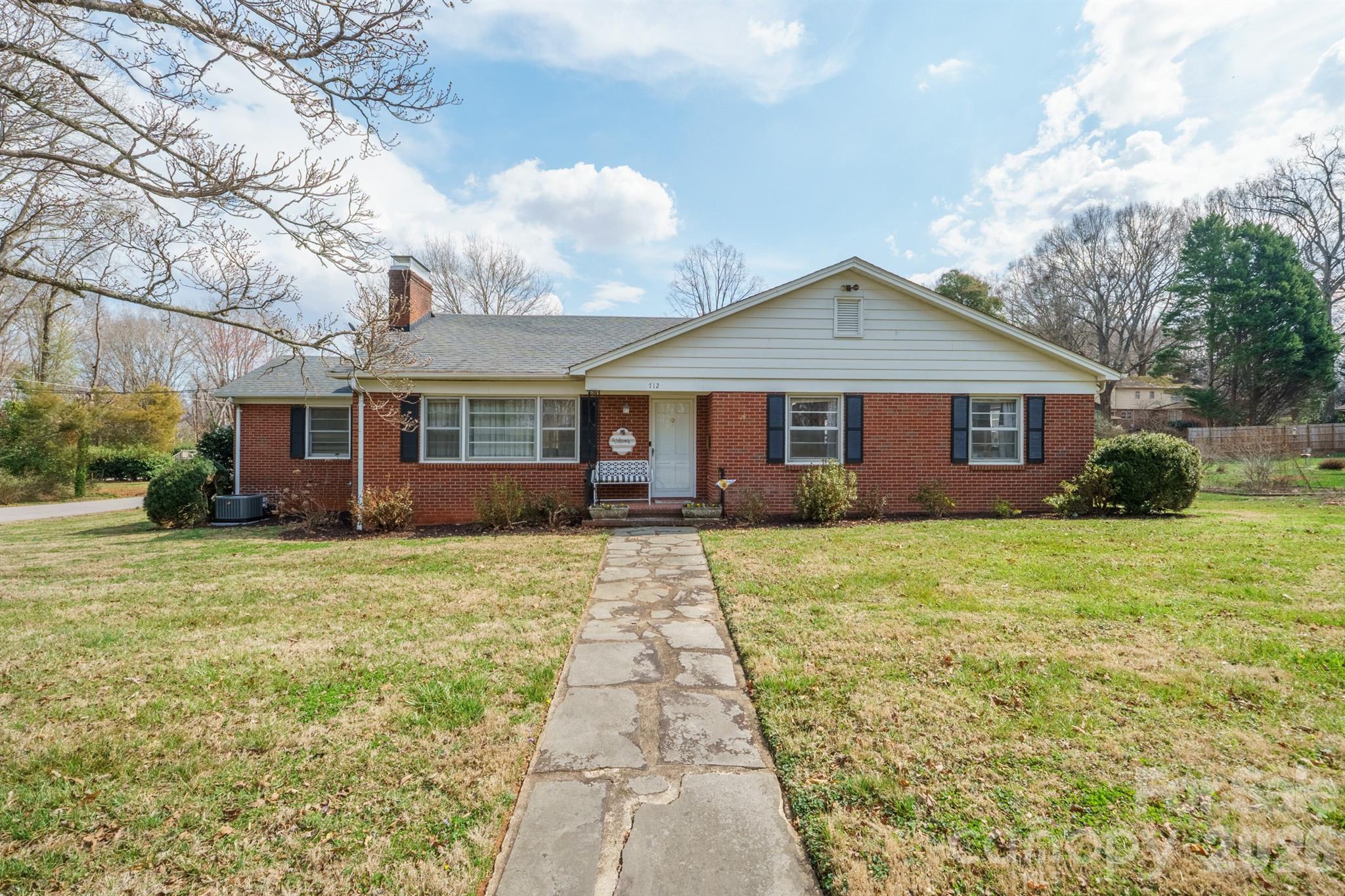 712 2nd Avenue Northwest Conover, NC 28613 - Photo 3 of 33 a front view of a house with a yard