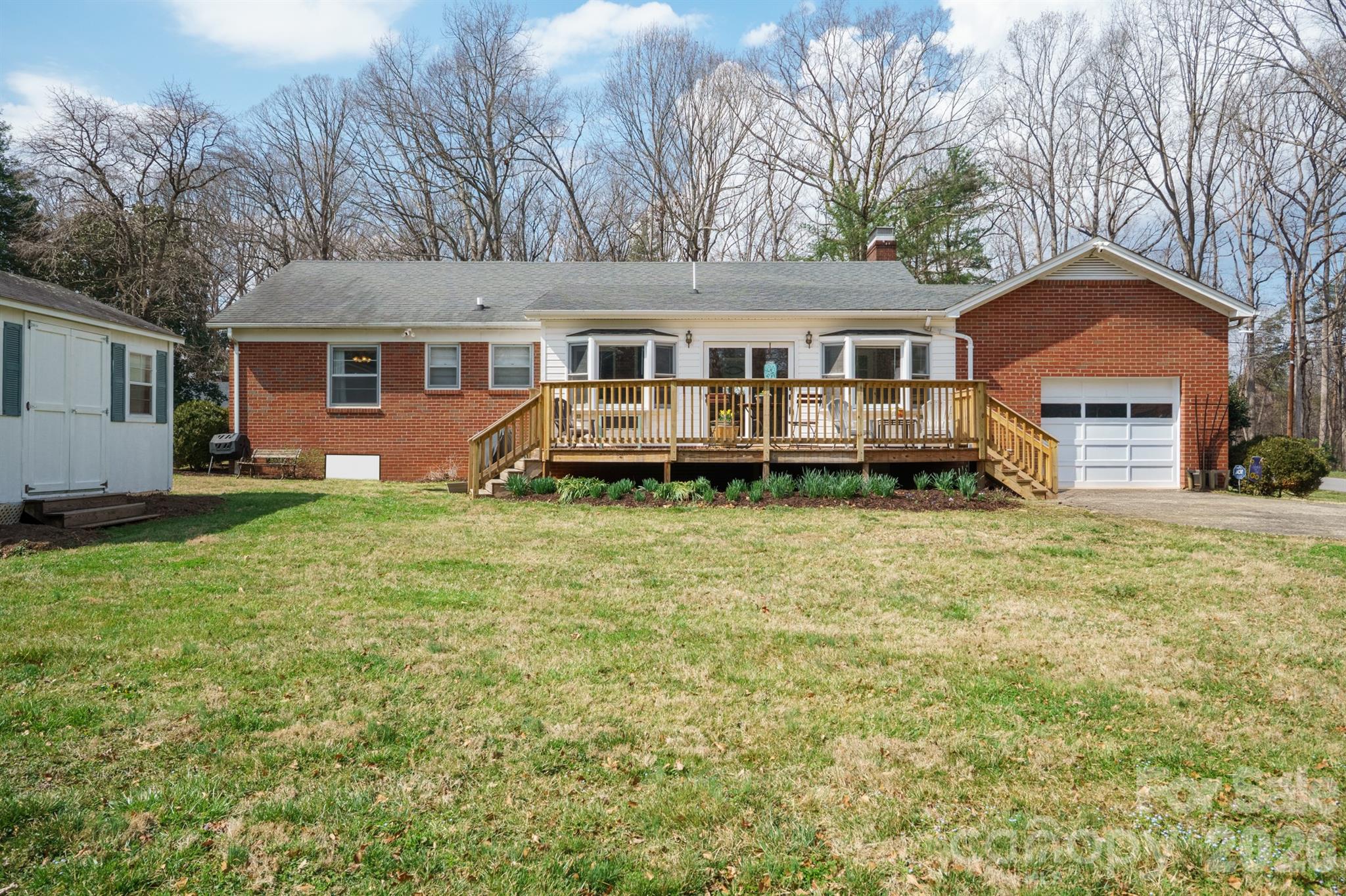 712 2nd Avenue Northwest Conover, NC 28613 - Photo 32 of 33 a front view of a house with garden