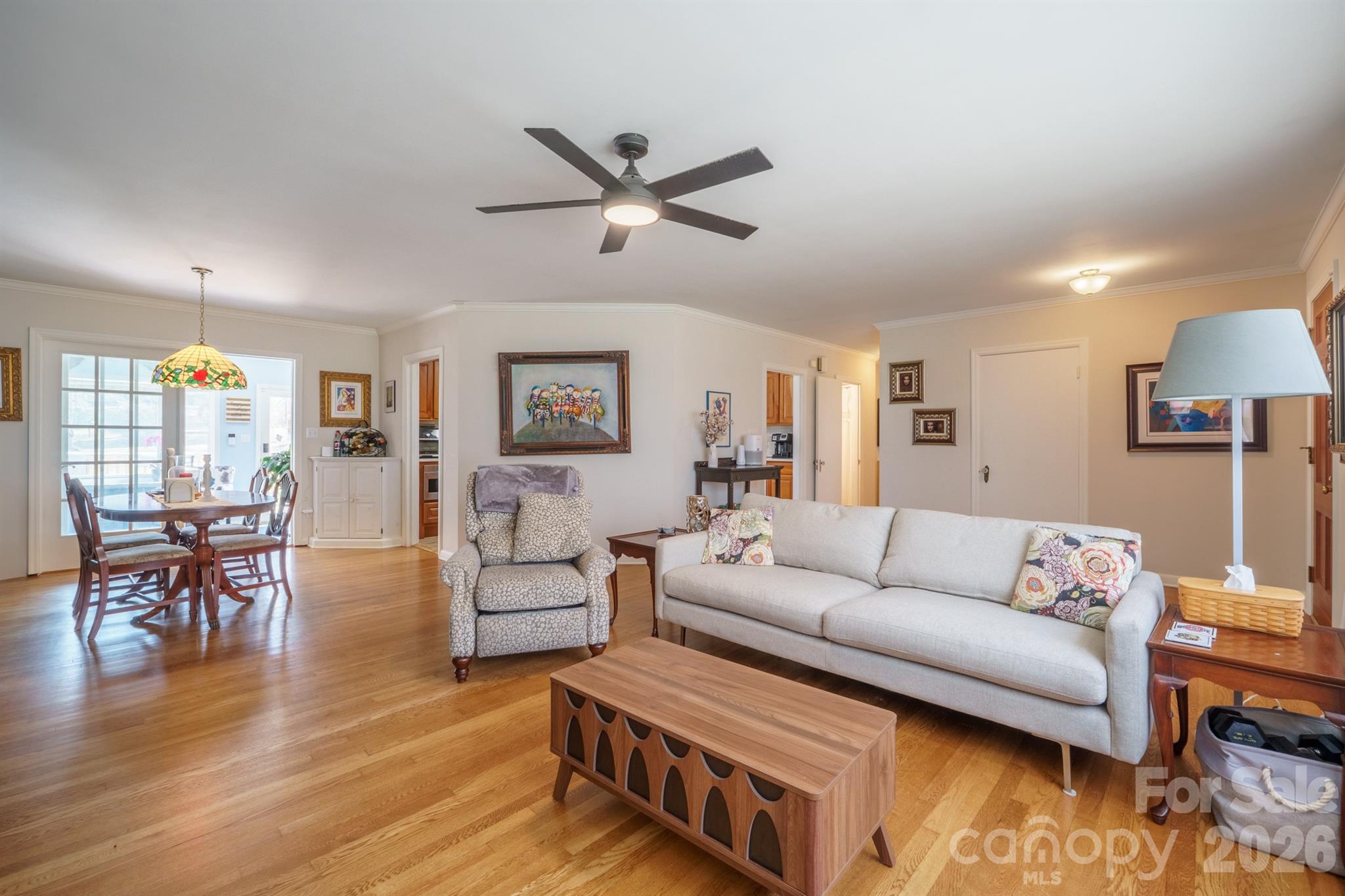 712 2nd Avenue Northwest Conover, NC 28613 - Photo 7 of 33 a living room with furniture and a wooden floor