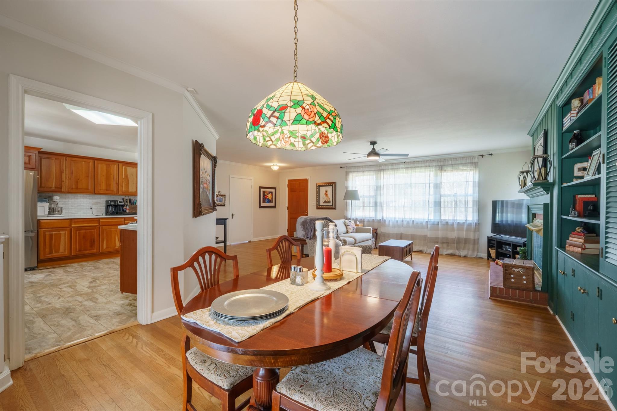 712 2nd Avenue Northwest Conover, NC 28613 - Photo 9 of 33 a view of a dining room with furniture window and wooden floor