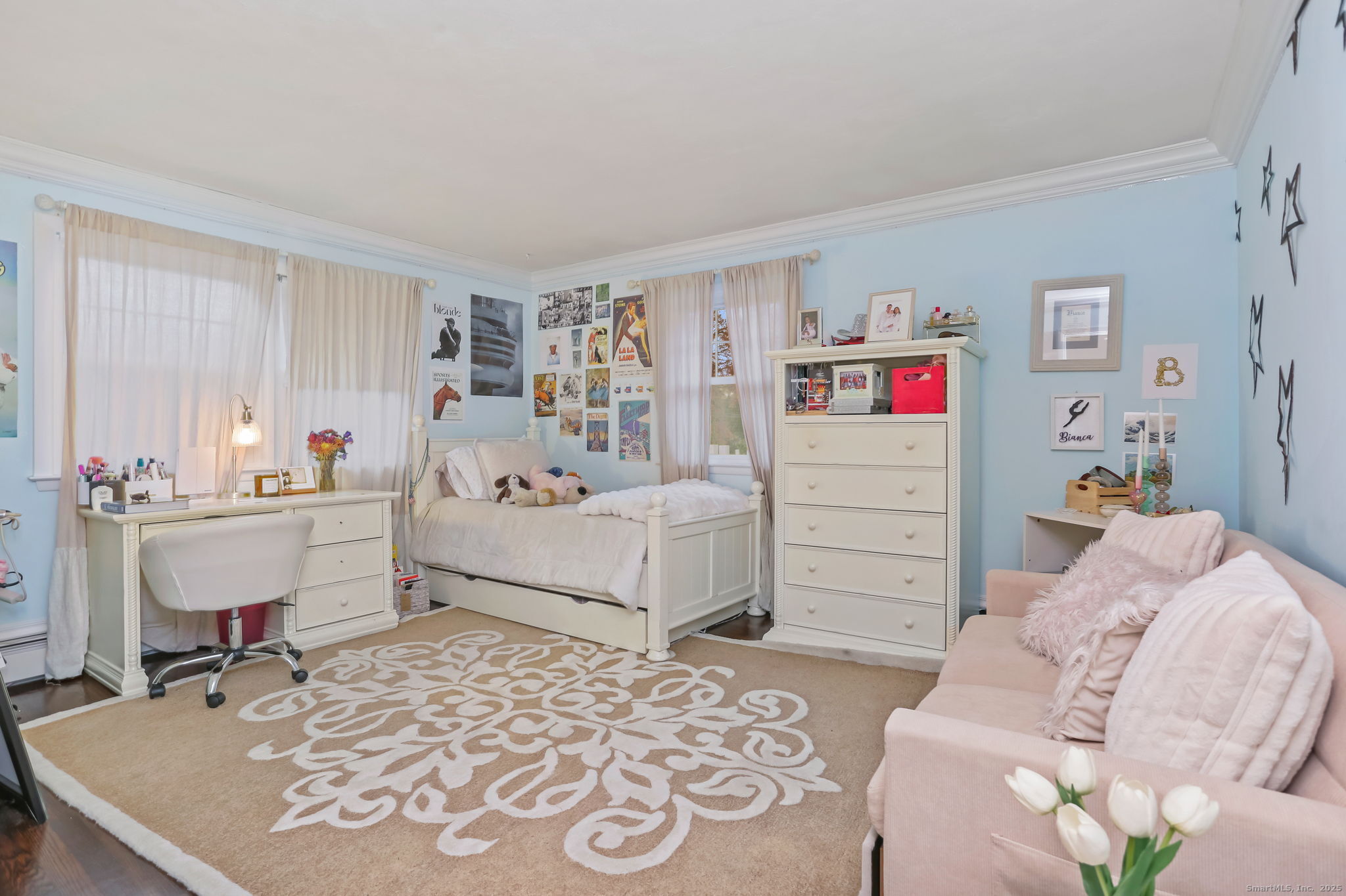 24 Warnock Drive Westport, CT 06880 - Photo 14 of 31 a bedroom with furniture and a wooden floor