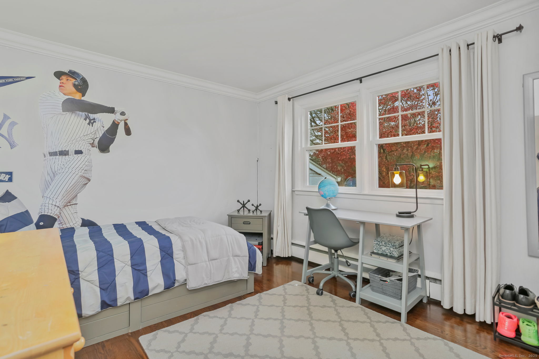 24 Warnock Drive Westport, CT 06880 - Photo 15 of 31 a bedroom with furniture and a window