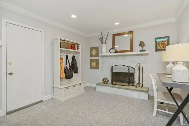 a bathroom with a toilet a sink and a mirror
