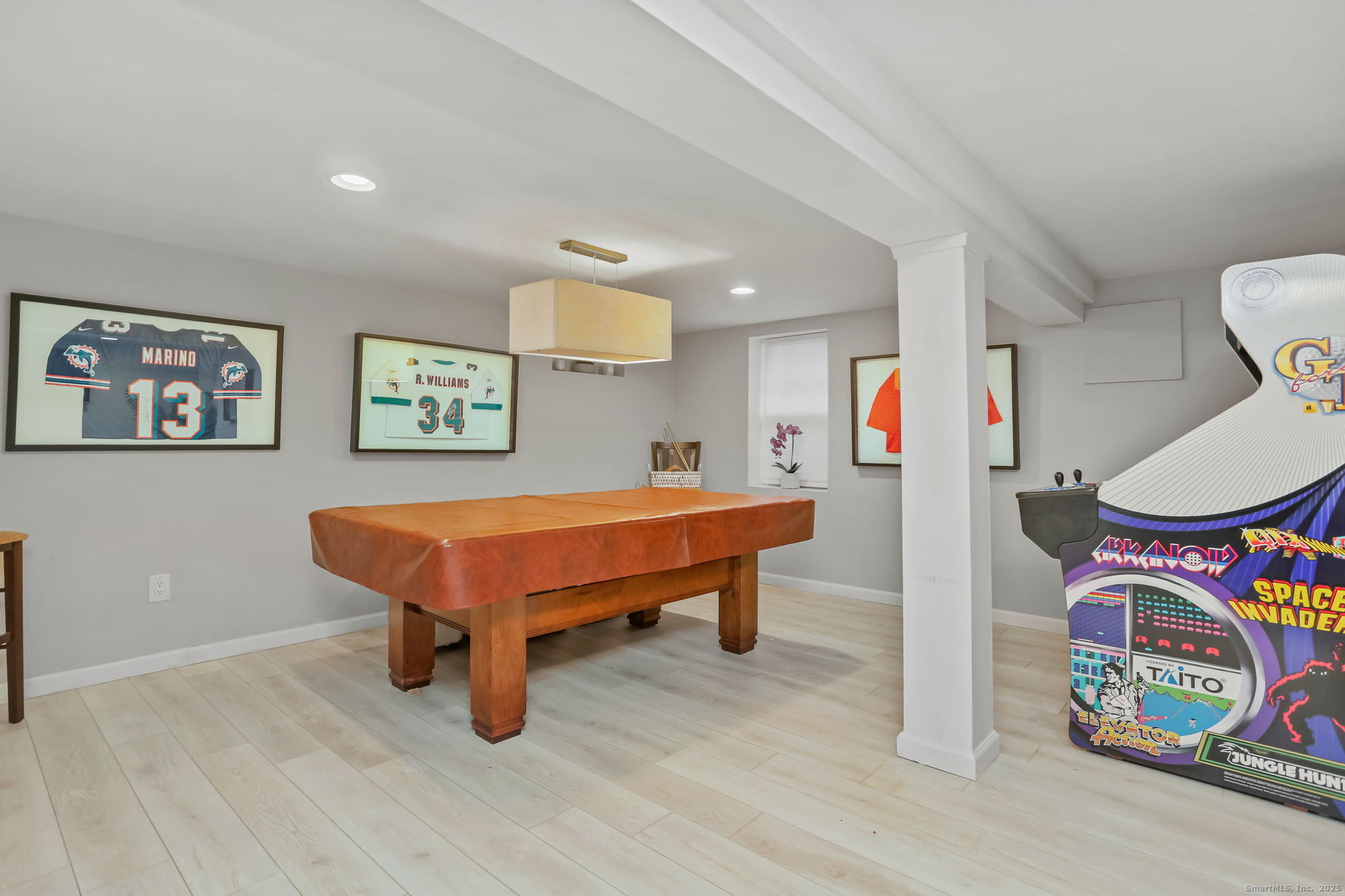 24 Warnock Drive Westport, CT 06880 - Photo 22 of 31 a room with furniture and wooden floor