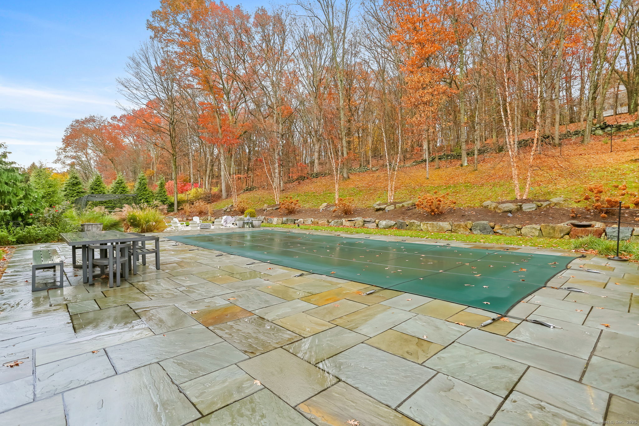24 Warnock Drive Westport, CT 06880 - Photo 25 of 31 a view of swimming pool with outdoor seating and plants