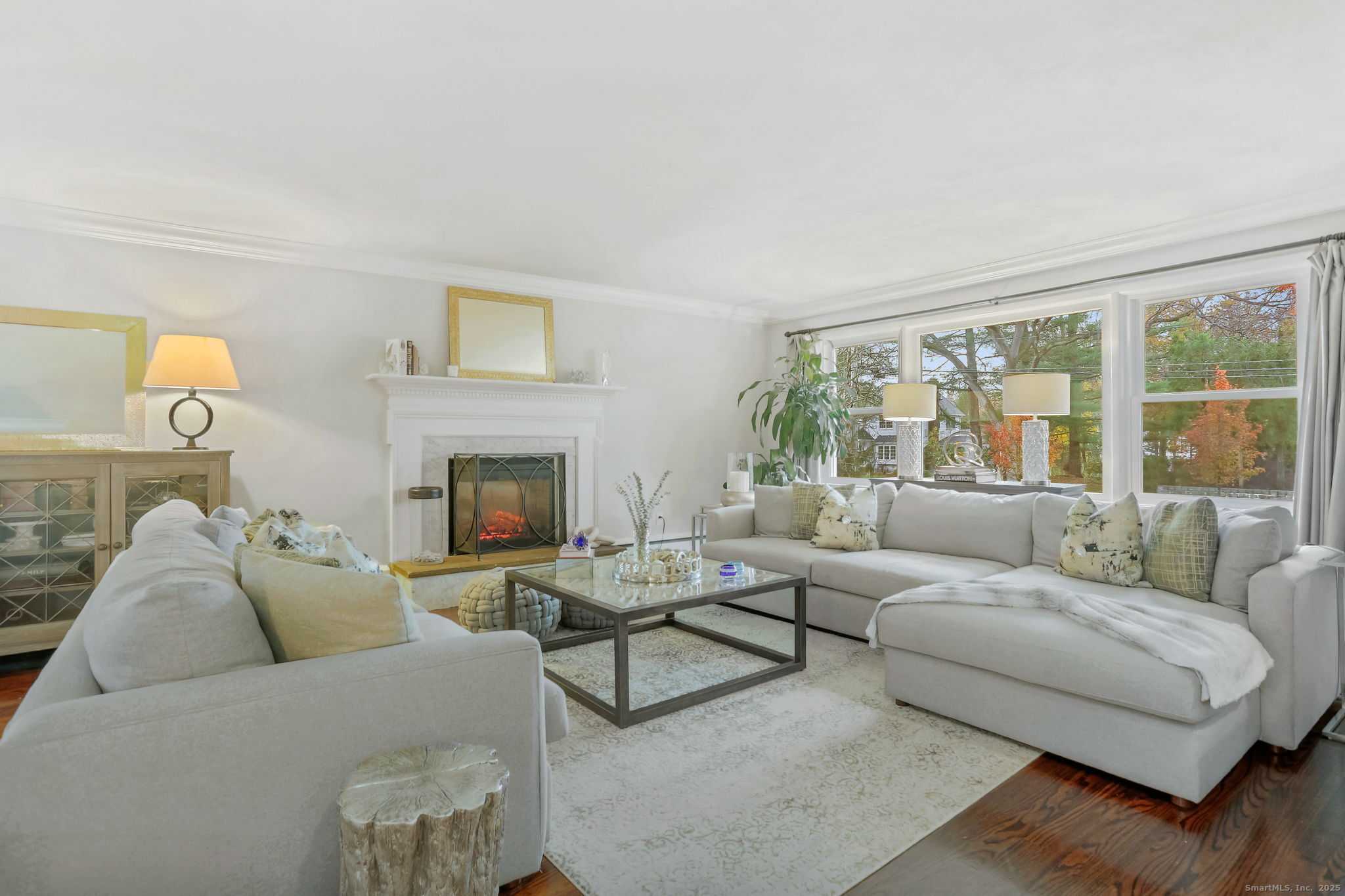 24 Warnock Drive Westport, CT 06880 - Photo 3 of 31 a living room with furniture and a fireplace