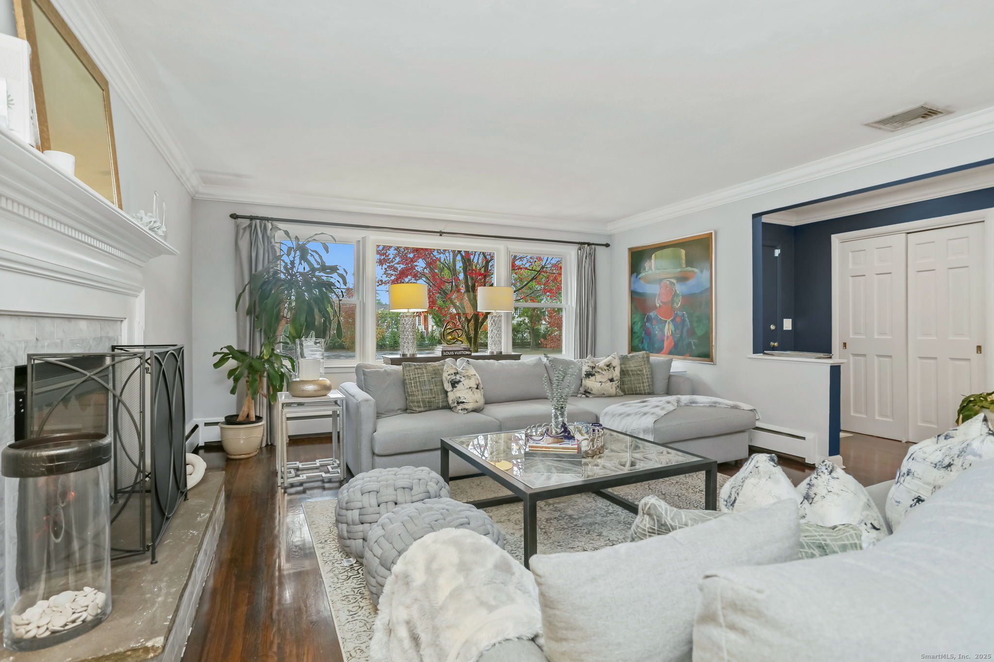 24 Warnock Drive Westport, CT 06880 - Photo 7 of 31 a living room with furniture and a fireplace