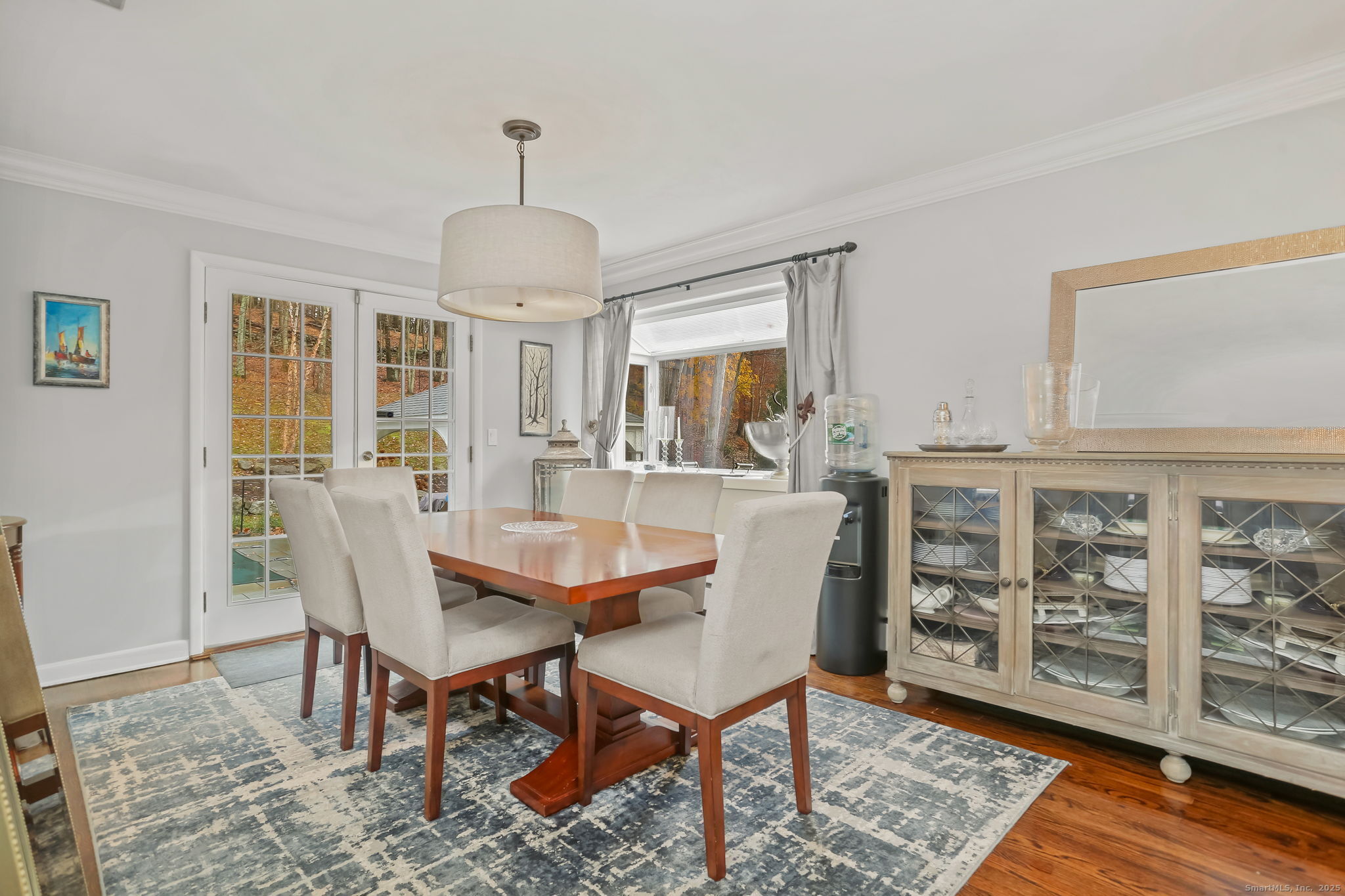 24 Warnock Drive Westport, CT 06880 - Photo 8 of 31 a view of a dining room with furniture window and wooden floor