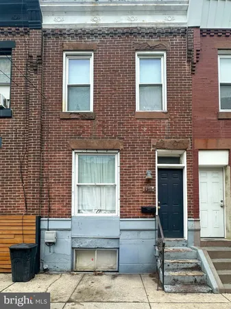 a front view of a house with a area