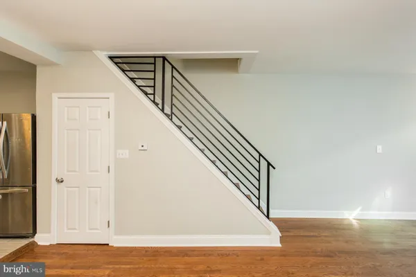 a view of a hallway with staircase
