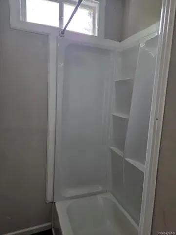 a bathroom with a bathtub