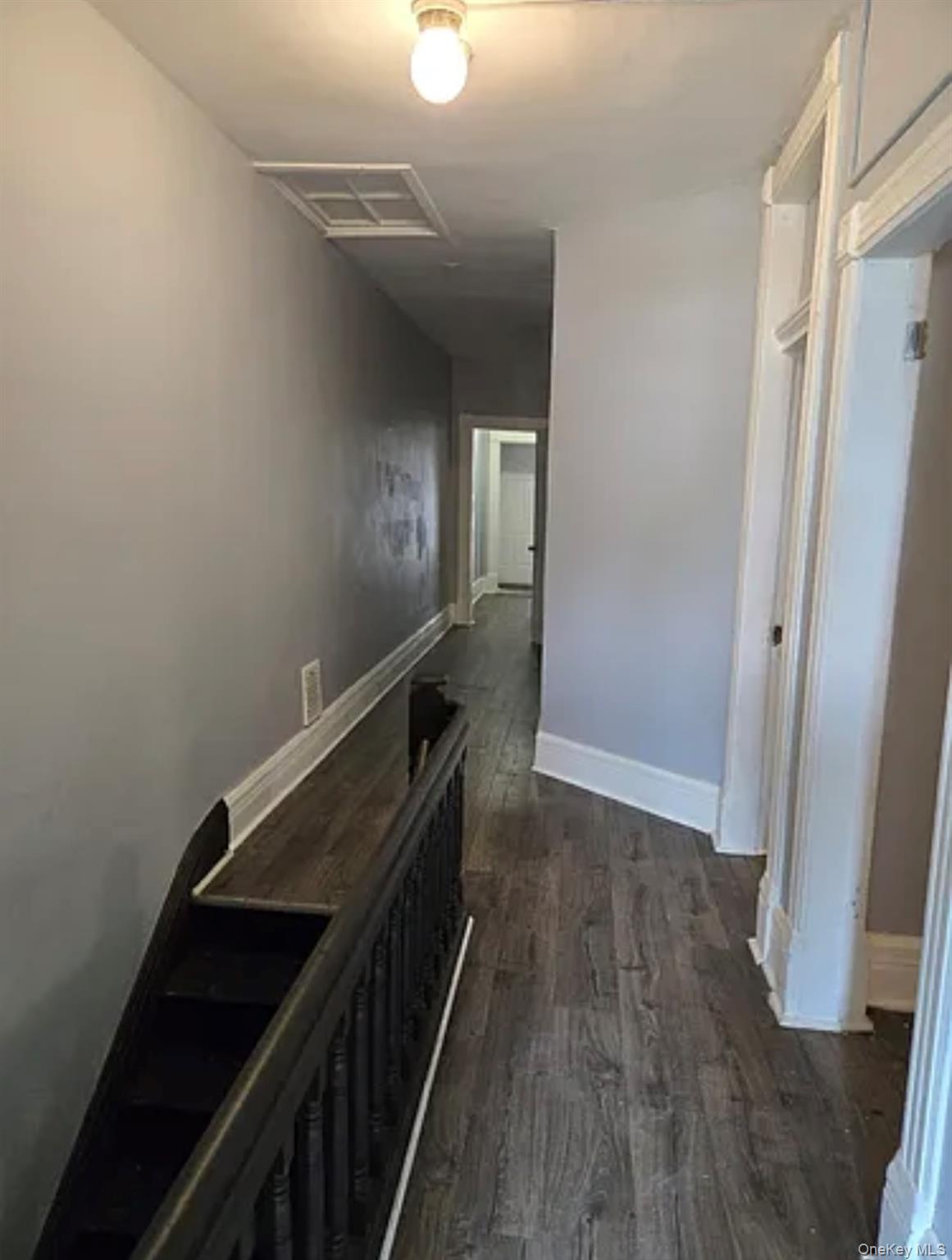 146 Mansion Street, Unit 2 Poughkeepsie, NY 12601 - Photo 6 of 14 a view of hallway with wooden floor