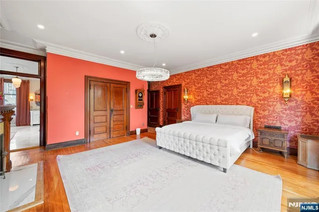 a bathroom with a granite countertop sink mirror shower and double