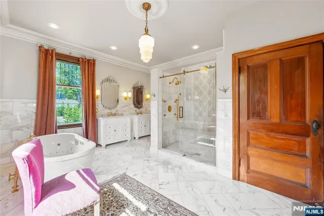 a bathroom with a double vanity sink mirror and double