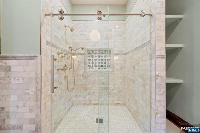 a bedroom with bed and a dresser