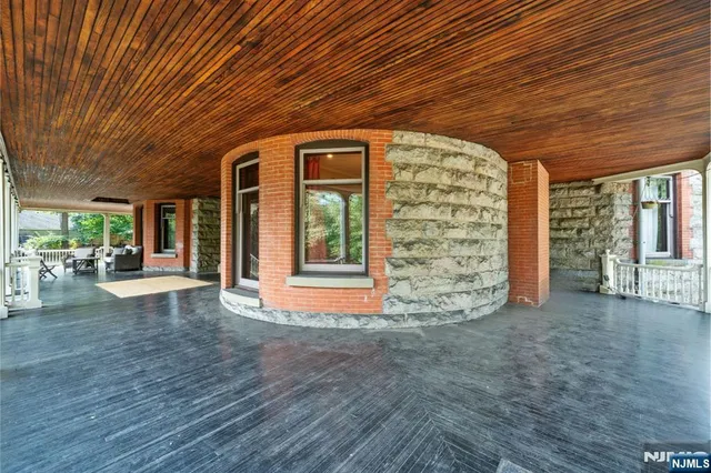 a patio with patio couch and chairs