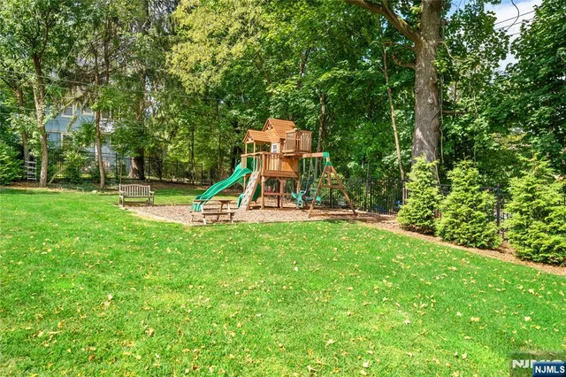 an aerial view of a house with a garden