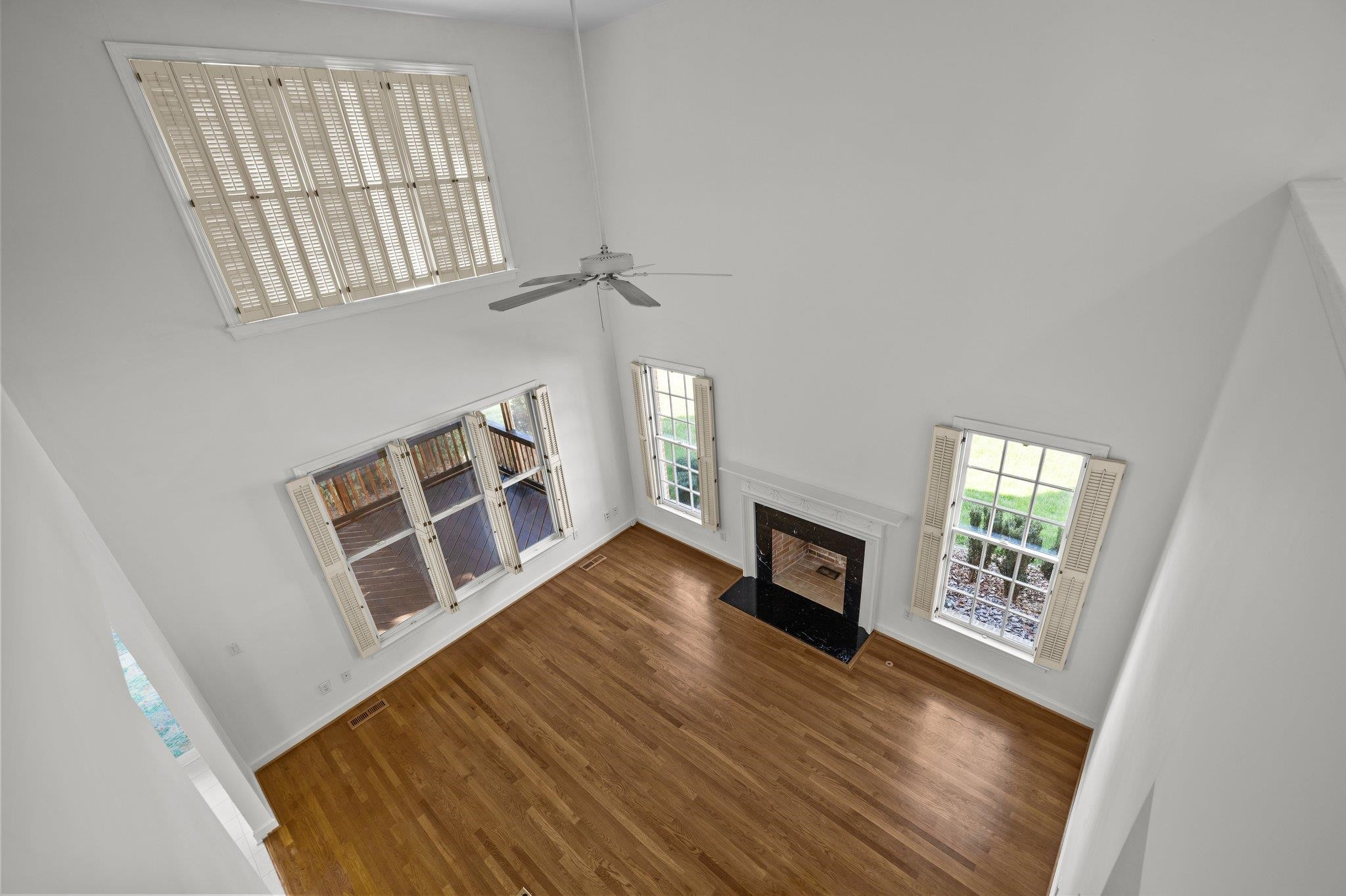8933 Windjammer Drive Raleigh, NC 27615 - Photo 15 of 57 Family Room looking down from 2nd floor landing