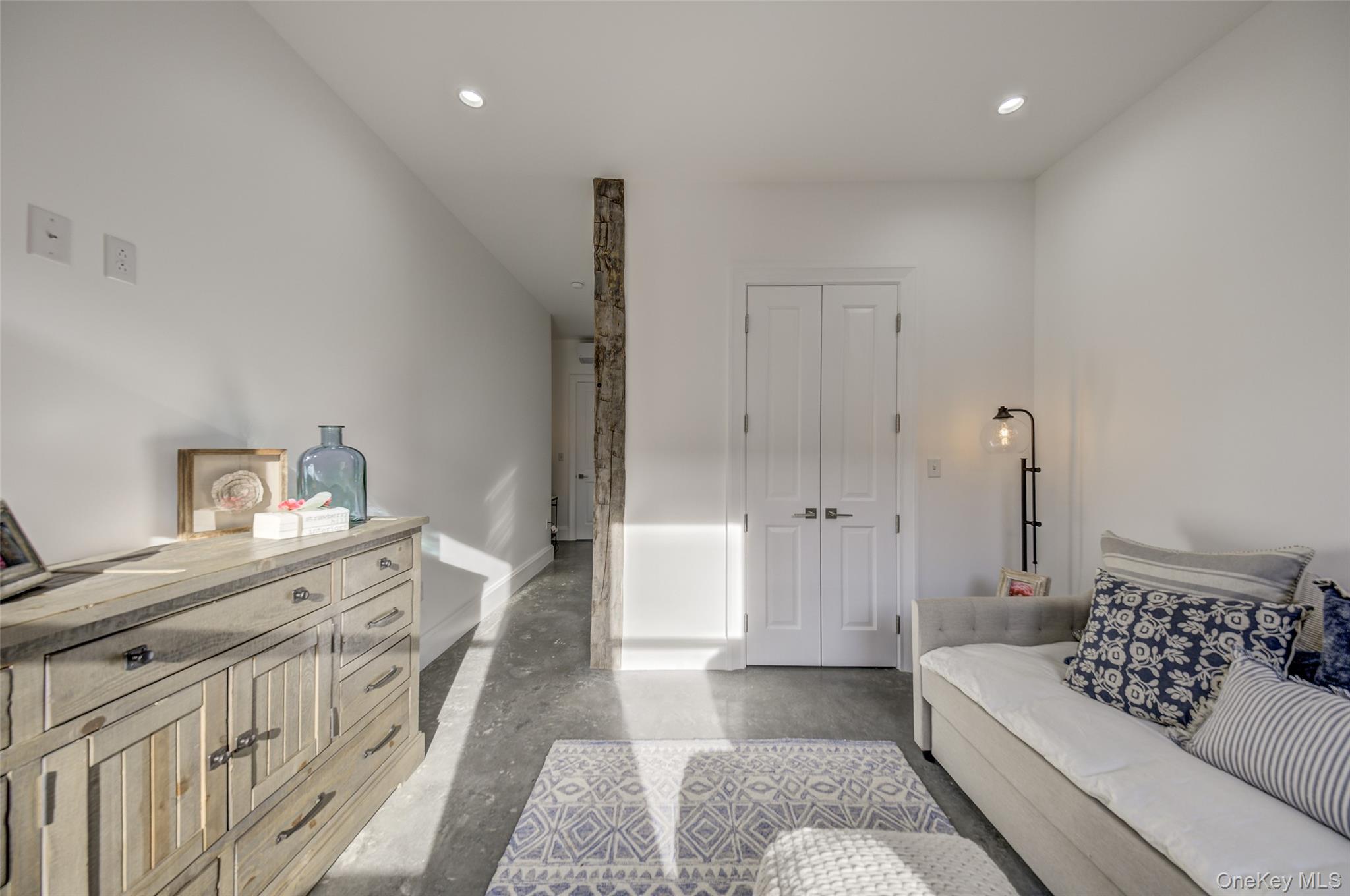 226 Main Street, Unit 302 Beacon, NY 12508 - Photo 24 of 43 Living area featuring concrete flooring and recessed lighting