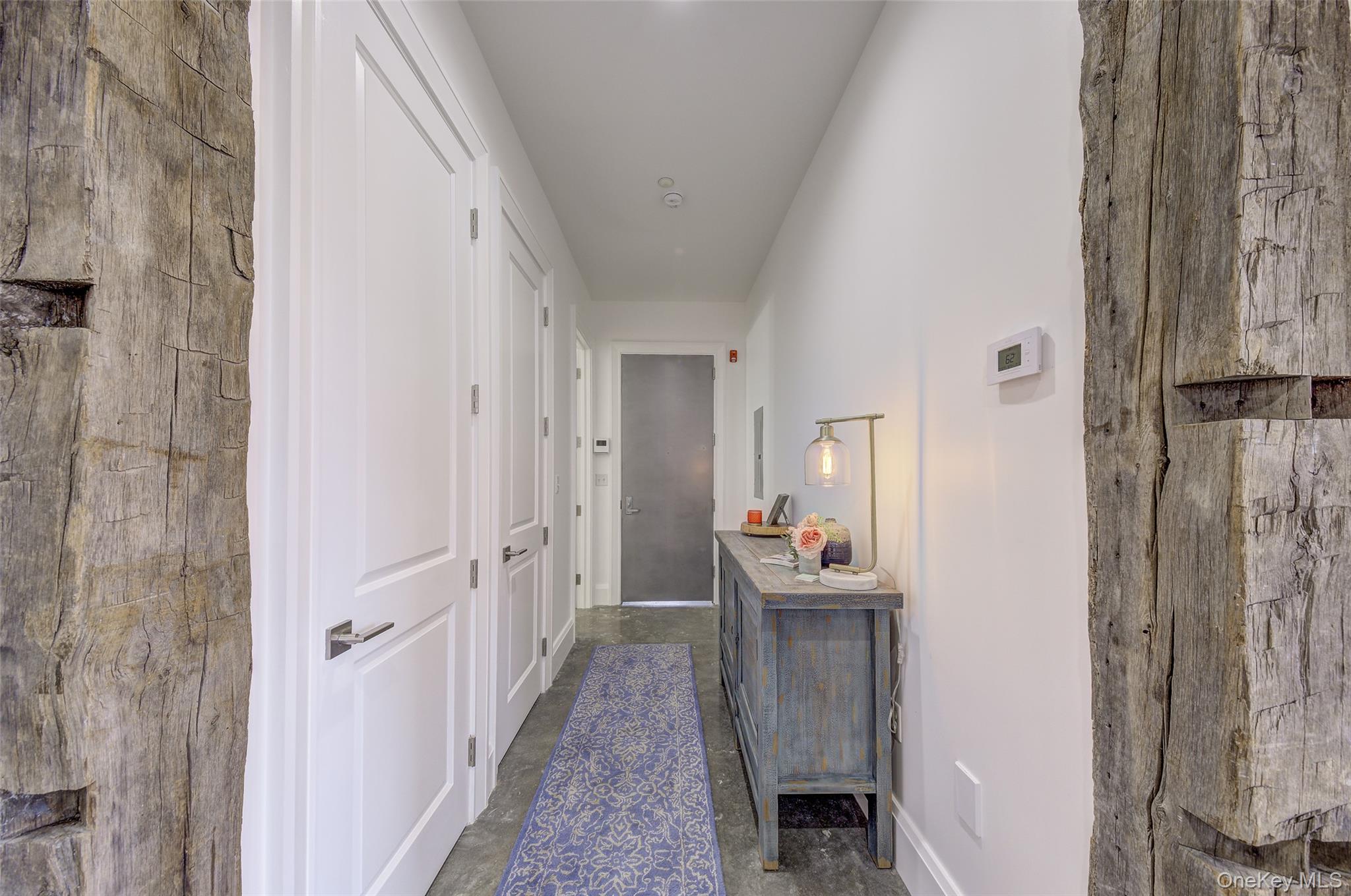 226 Main Street, Unit 302 Beacon, NY 12508 - Photo 38 of 43 Hall featuring concrete flooring and baseboards