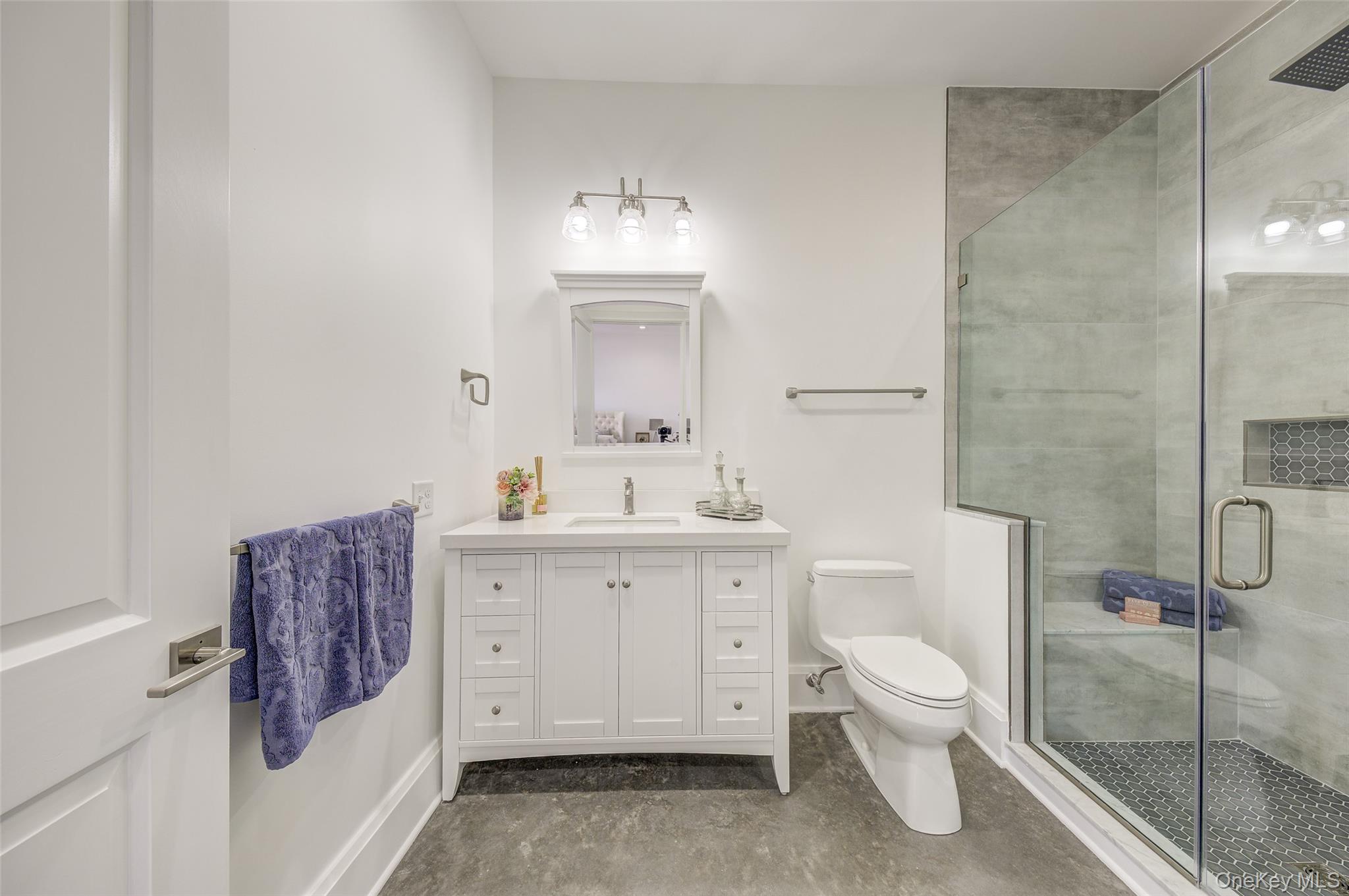 226 Main Street, Unit 302 Beacon, NY 12508 - Photo 39 of 43 Bathroom featuring vanity and a shower stall