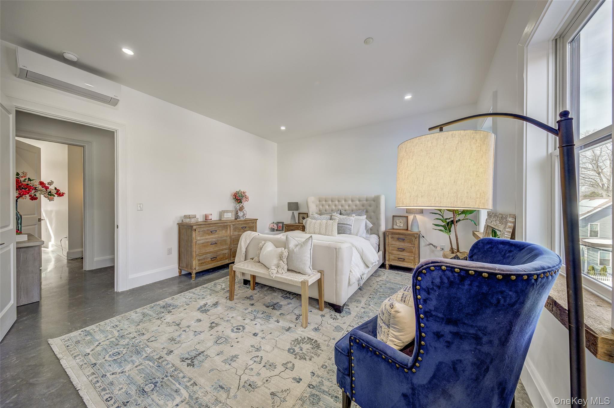 226 Main Street, Unit 302 Beacon, NY 12508 - Photo 9 of 43 Bedroom featuring concrete floors, an AC wall unit, and recessed lighting