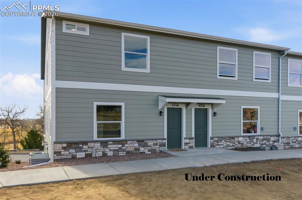 a view of house with outdoor space