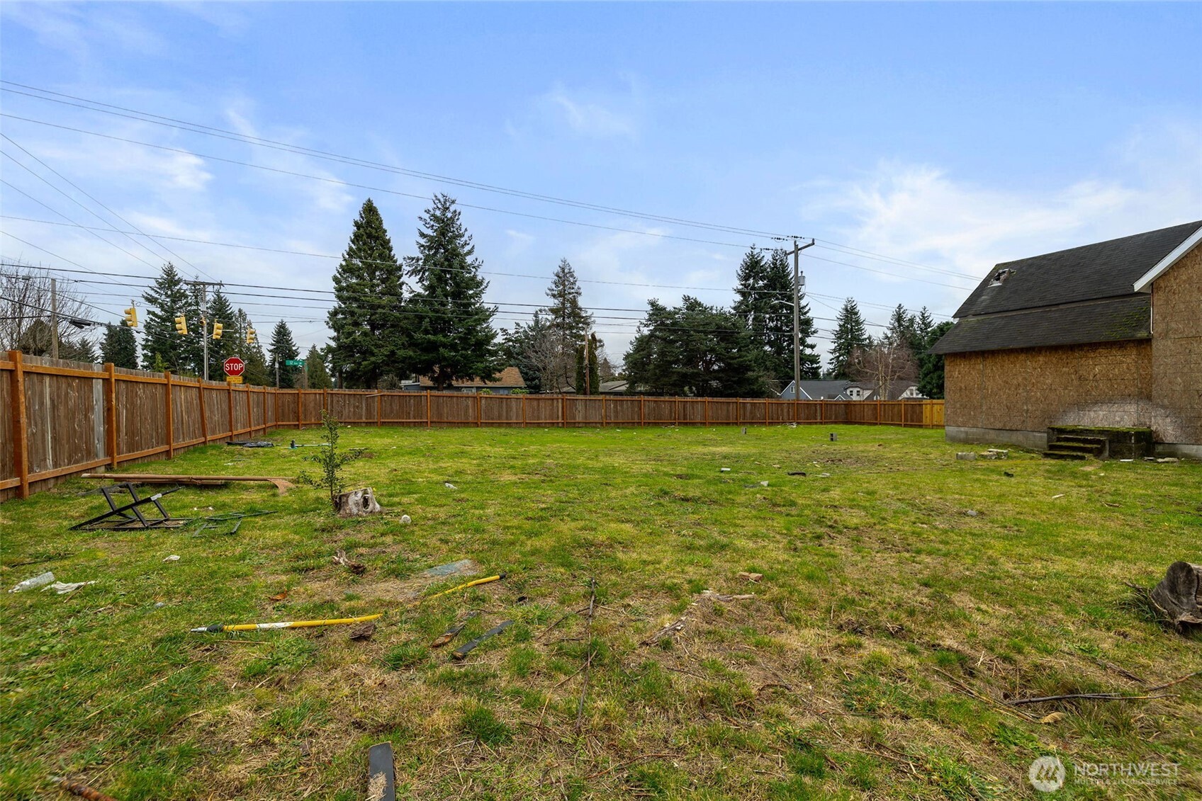 11205 12th Avenue Southwest Seattle, WA 98146 - Photo 14 of 36 a view of outdoor space with swimming pool and trees in the background