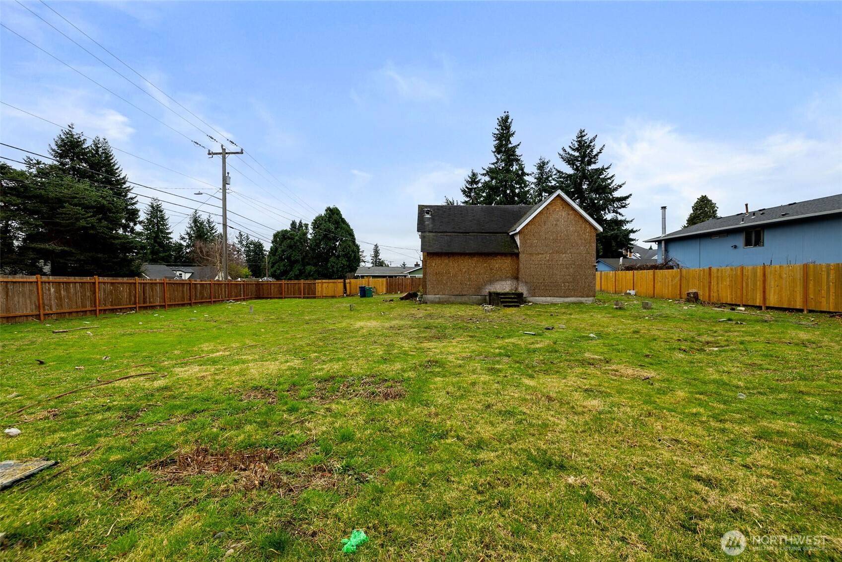 11205 12th Avenue Southwest Seattle, WA 98146 - Photo 15 of 36 a front view of a house with garden