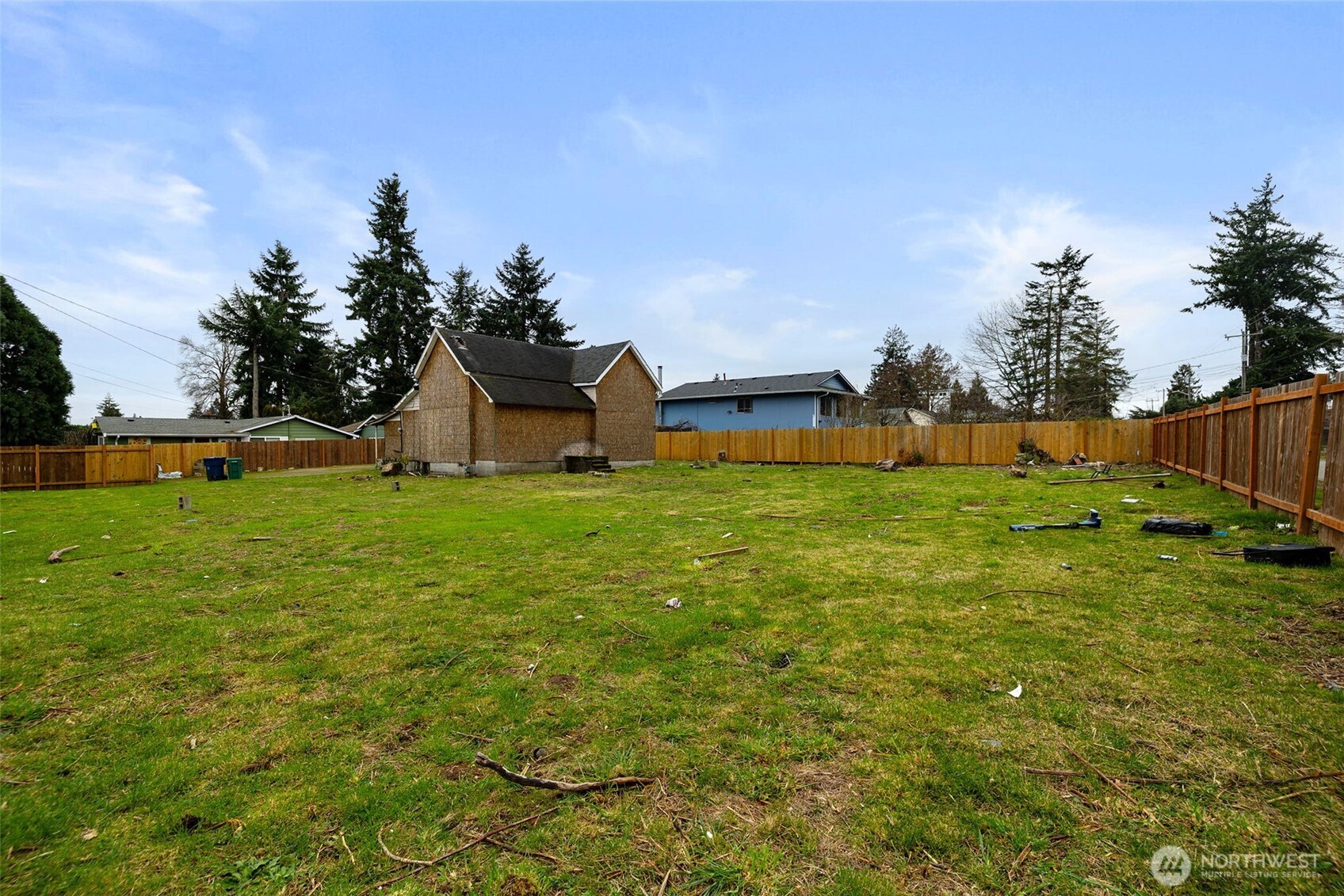 11205 12th Avenue Southwest Seattle, WA 98146 - Photo 16 of 36 a view of a house with a yard