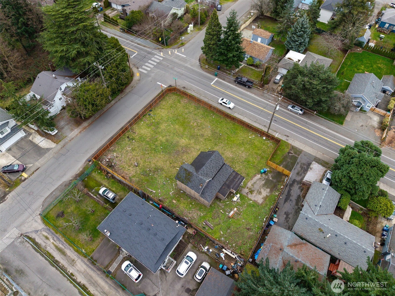 11205 12th Avenue Southwest Seattle, WA 98146 - Photo 23 of 36 an aerial view of a house with a garden and swimming pool