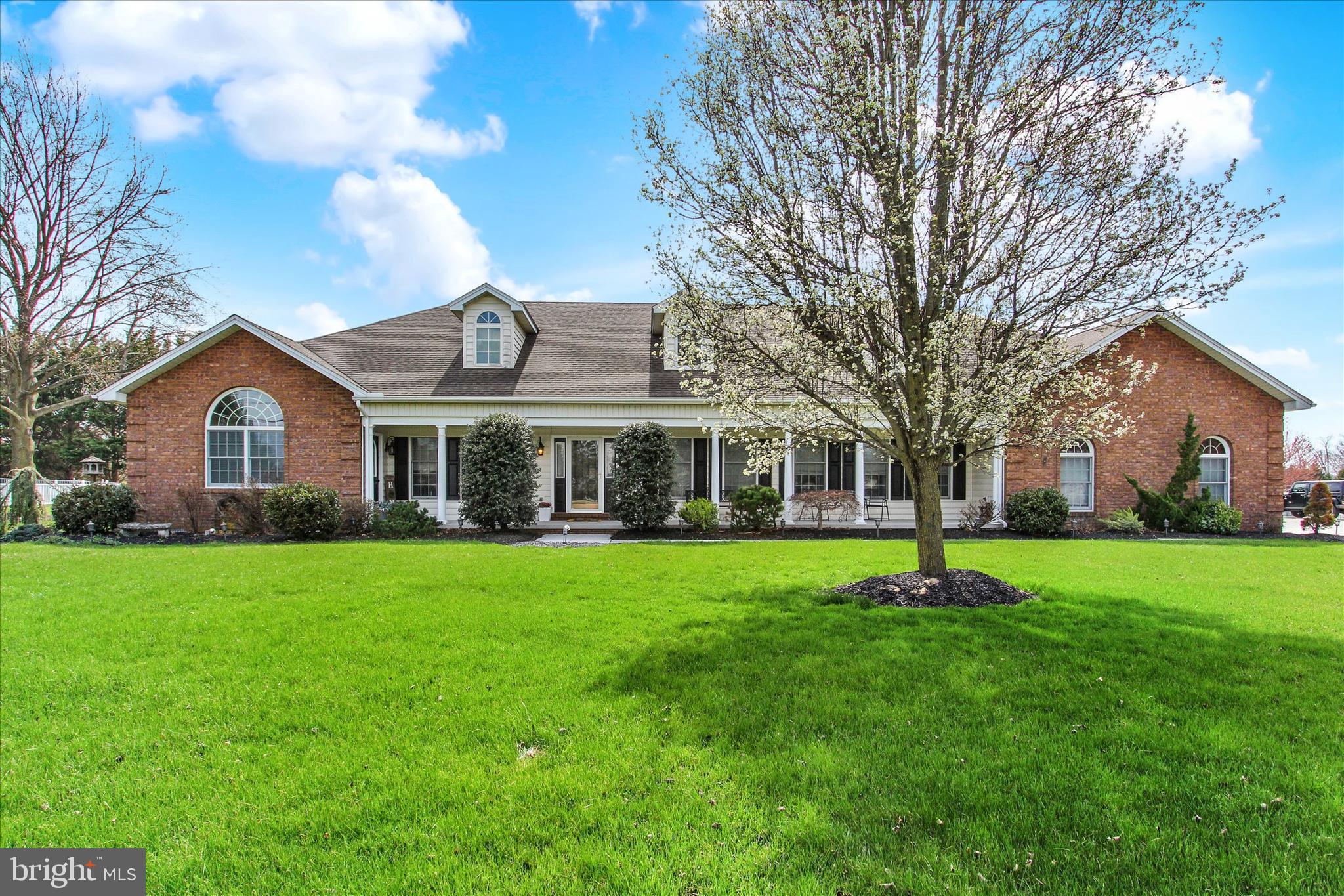 266 Fairview Drive Hanover, PA 17331 - Photo 1 of 49 a front view of a house with a garden