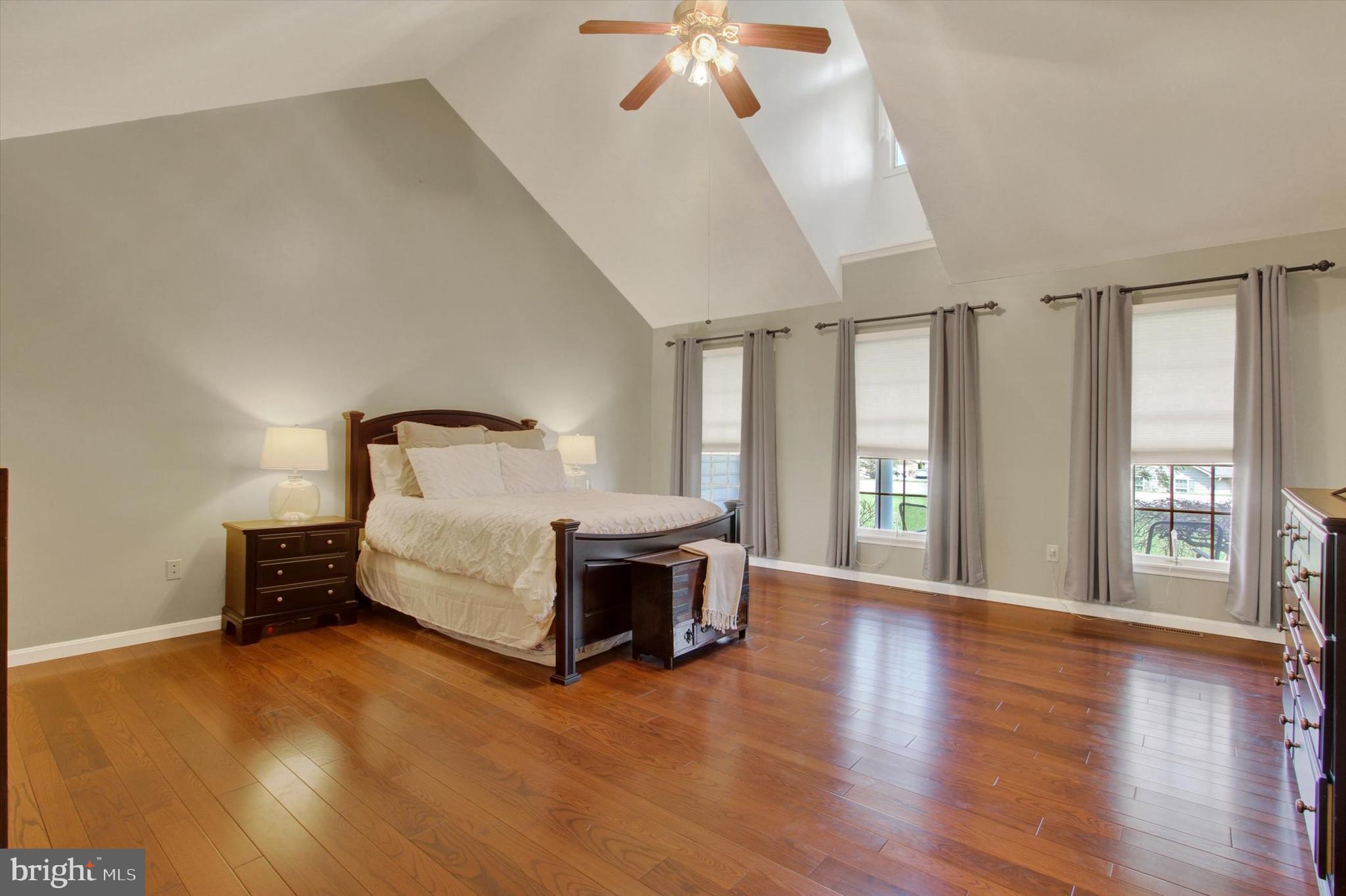 266 Fairview Drive Hanover, PA 17331 - Photo 17 of 49 a spacious bedroom with a bed and a chandelier