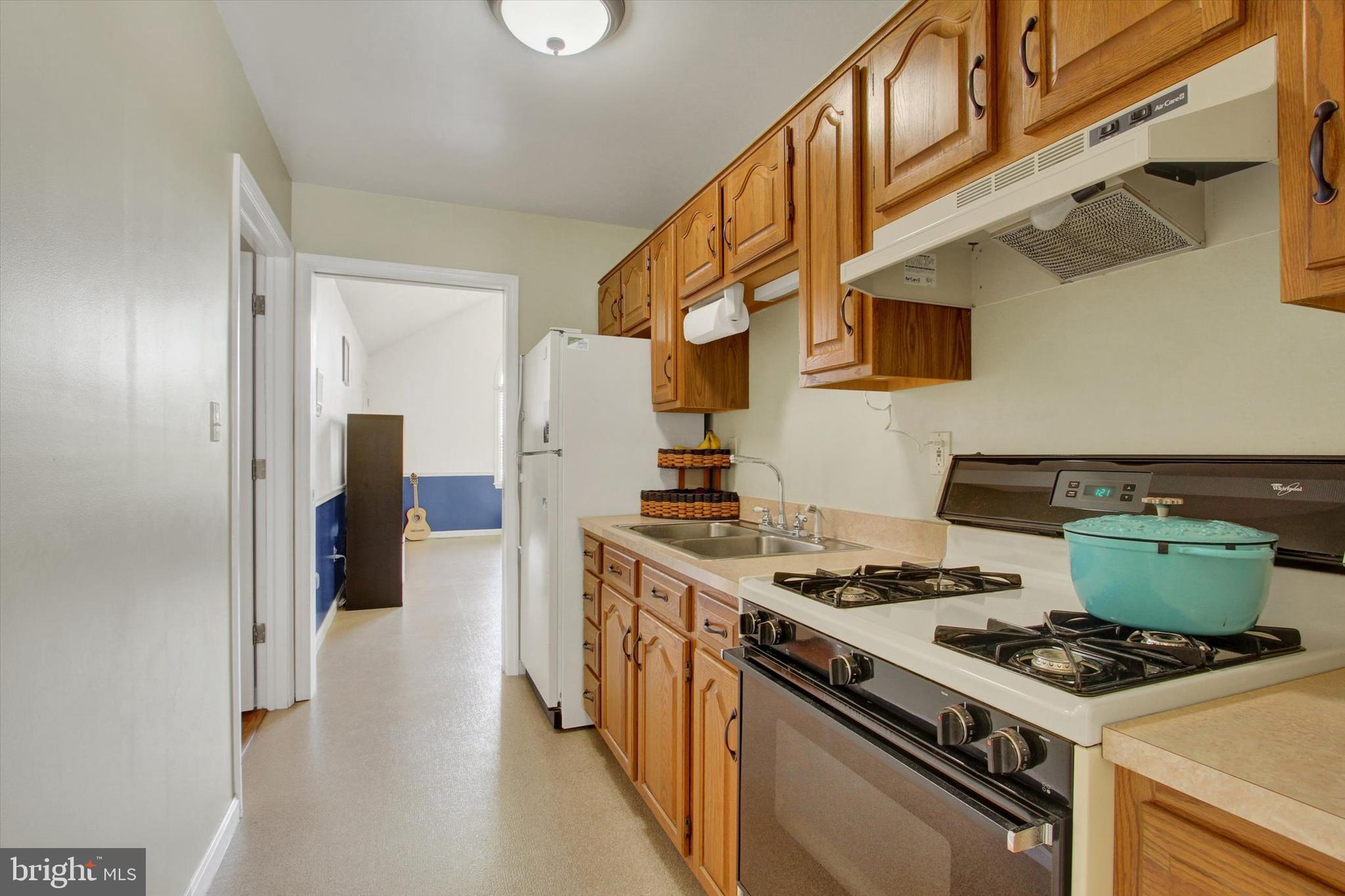 266 Fairview Drive Hanover, PA 17331 - Photo 24 of 49 a kitchen with a stove and a refrigerator