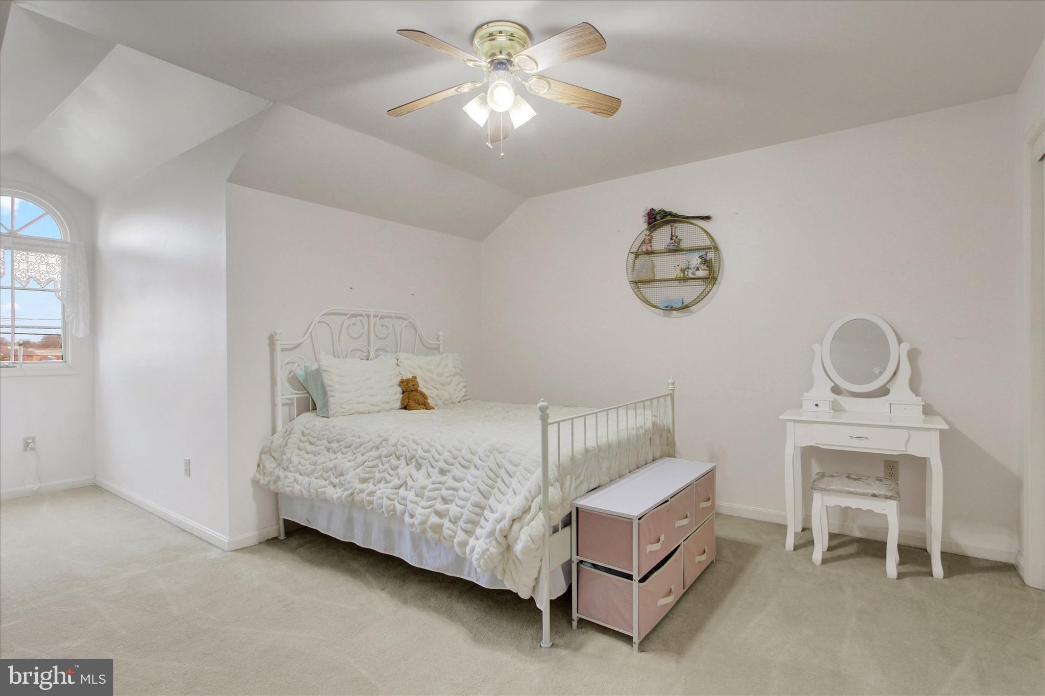 266 Fairview Drive Hanover, PA 17331 - Photo 28 of 49 a bedroom with a bed and a chandelier