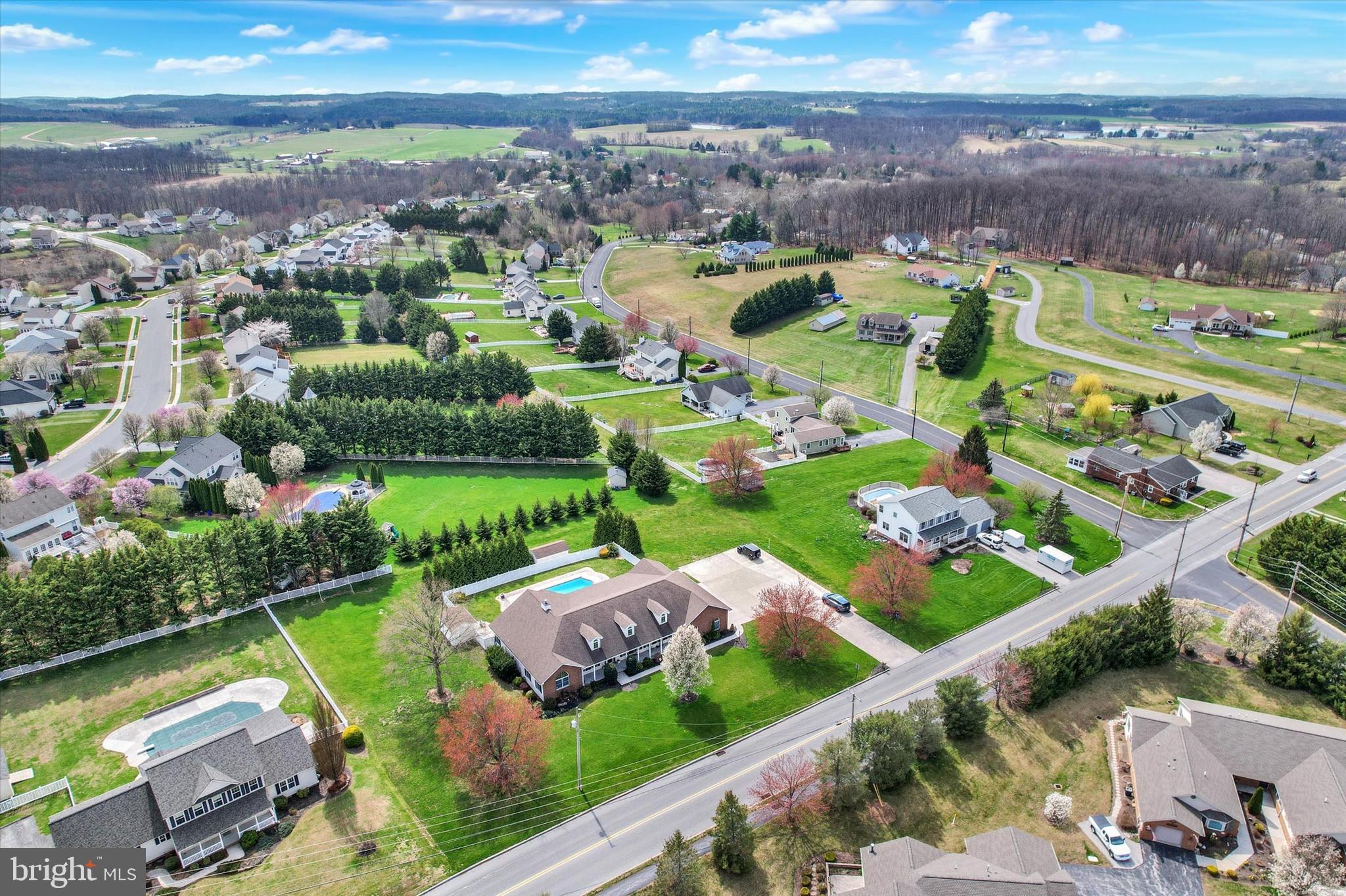 266 Fairview Drive Hanover, PA 17331 - Photo 45 of 49 an aerial view of a city with lots of residential buildings and mountain view in back