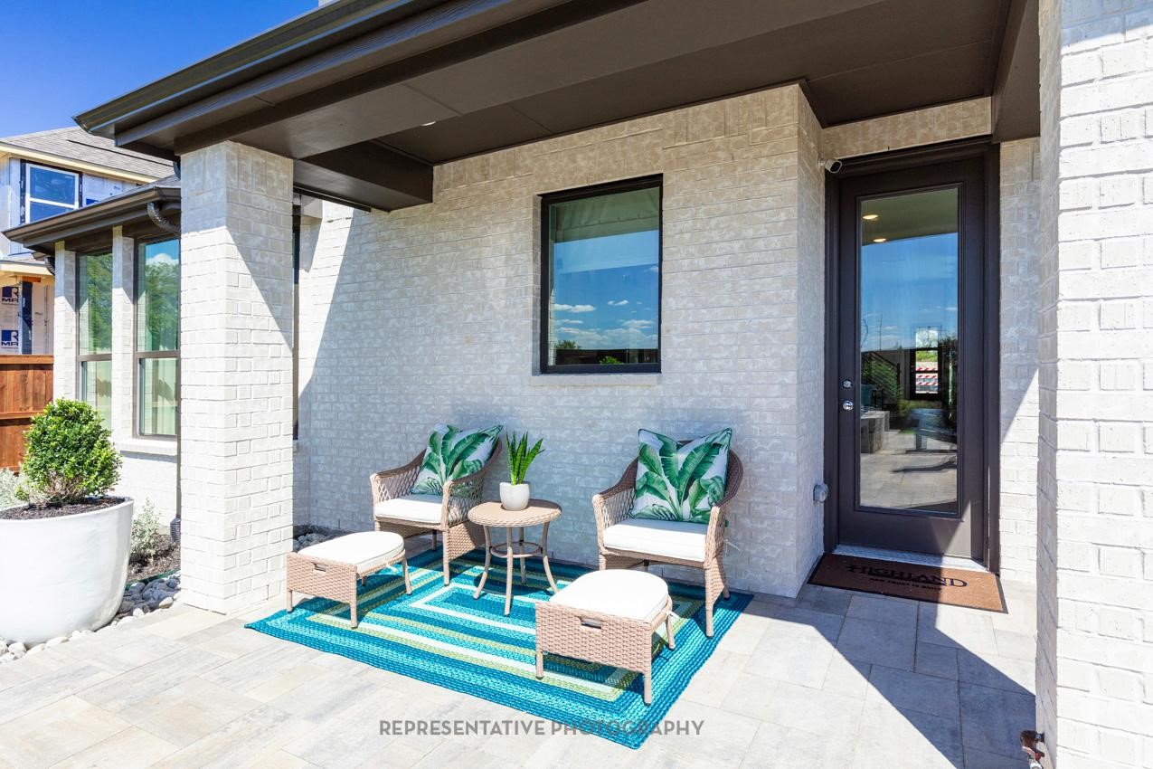 10330 Da Silva Street Manvel, TX 77578 - Photo 14 of 17 a outdoor living space with furniture and a potted plant