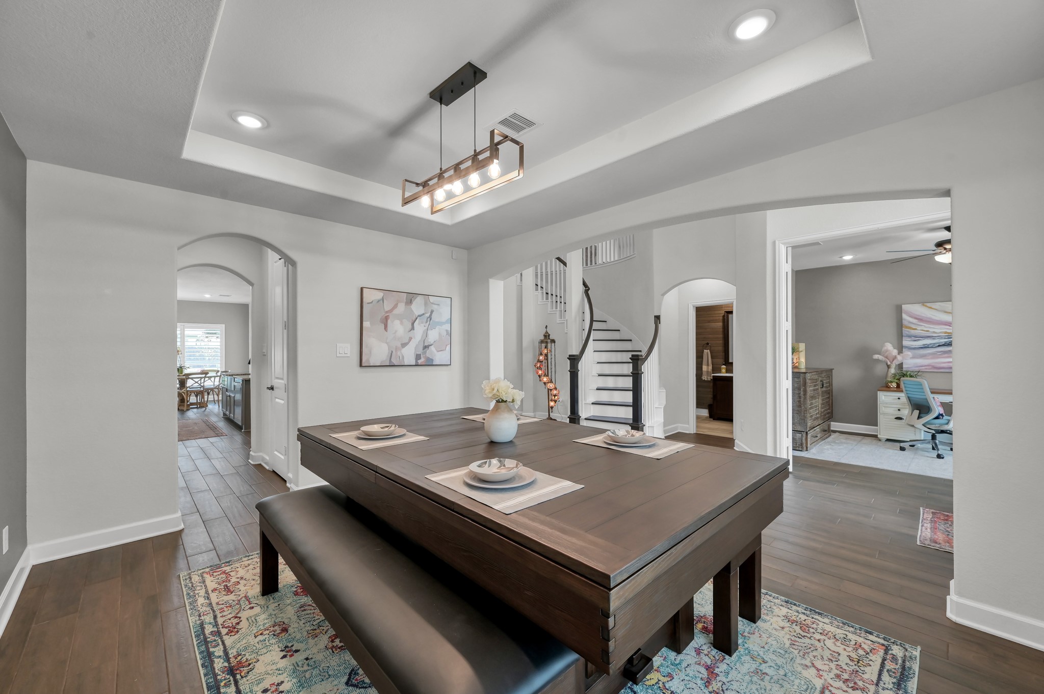 25015 Karacabey Court Spring, TX 77389 - Photo 8 of 49 From the corner of this dining room you can see into the study, the half bath, through the butlers pantry into the kitchen and breakfast area!