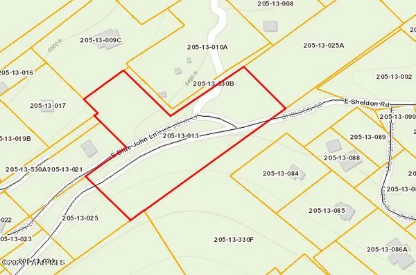 a close up of a wall with a street