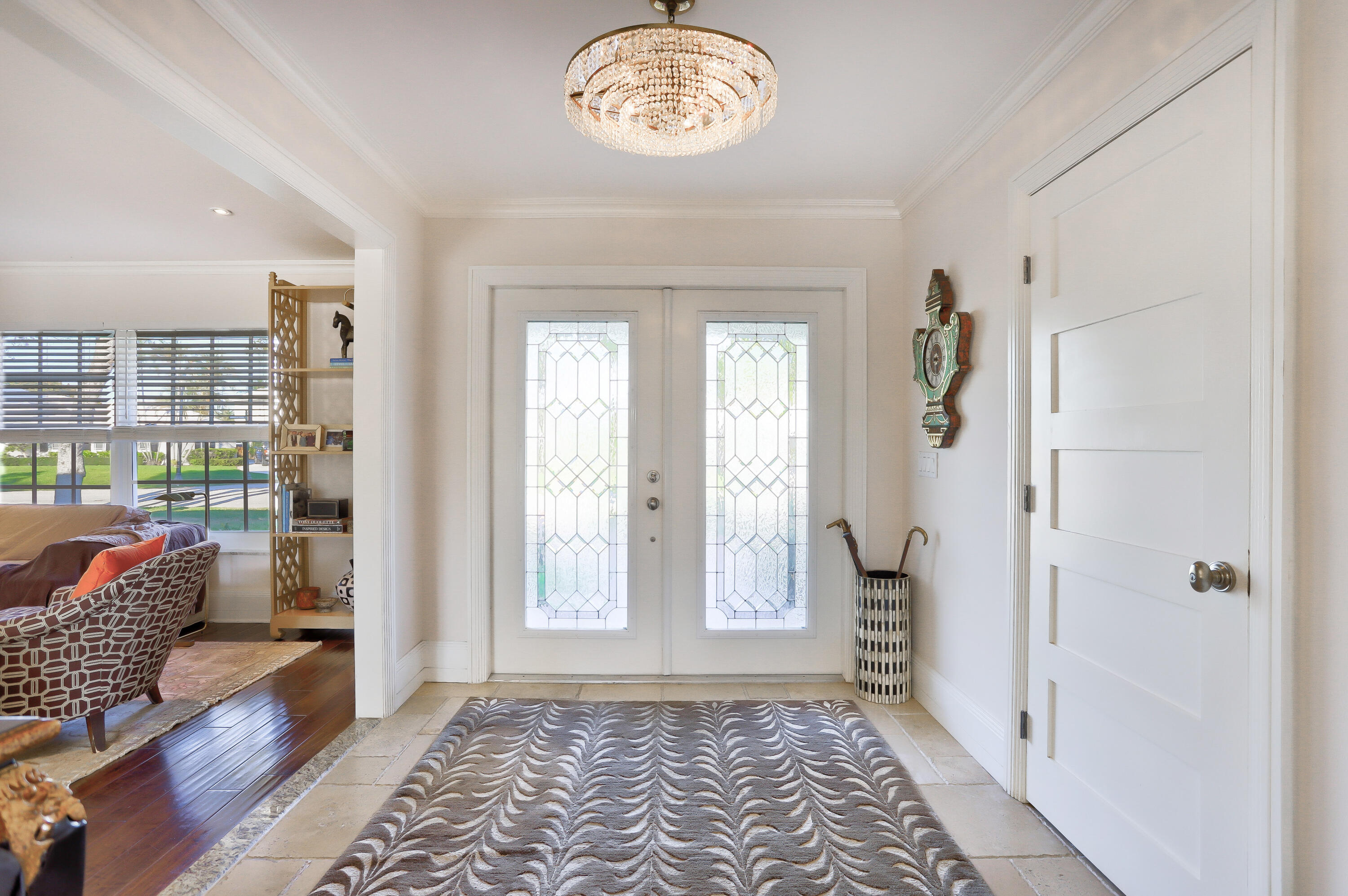 835 Canary Walk Delray Beach, FL 33483 - Photo 12 of 42 a view of an entryway with wooden floor