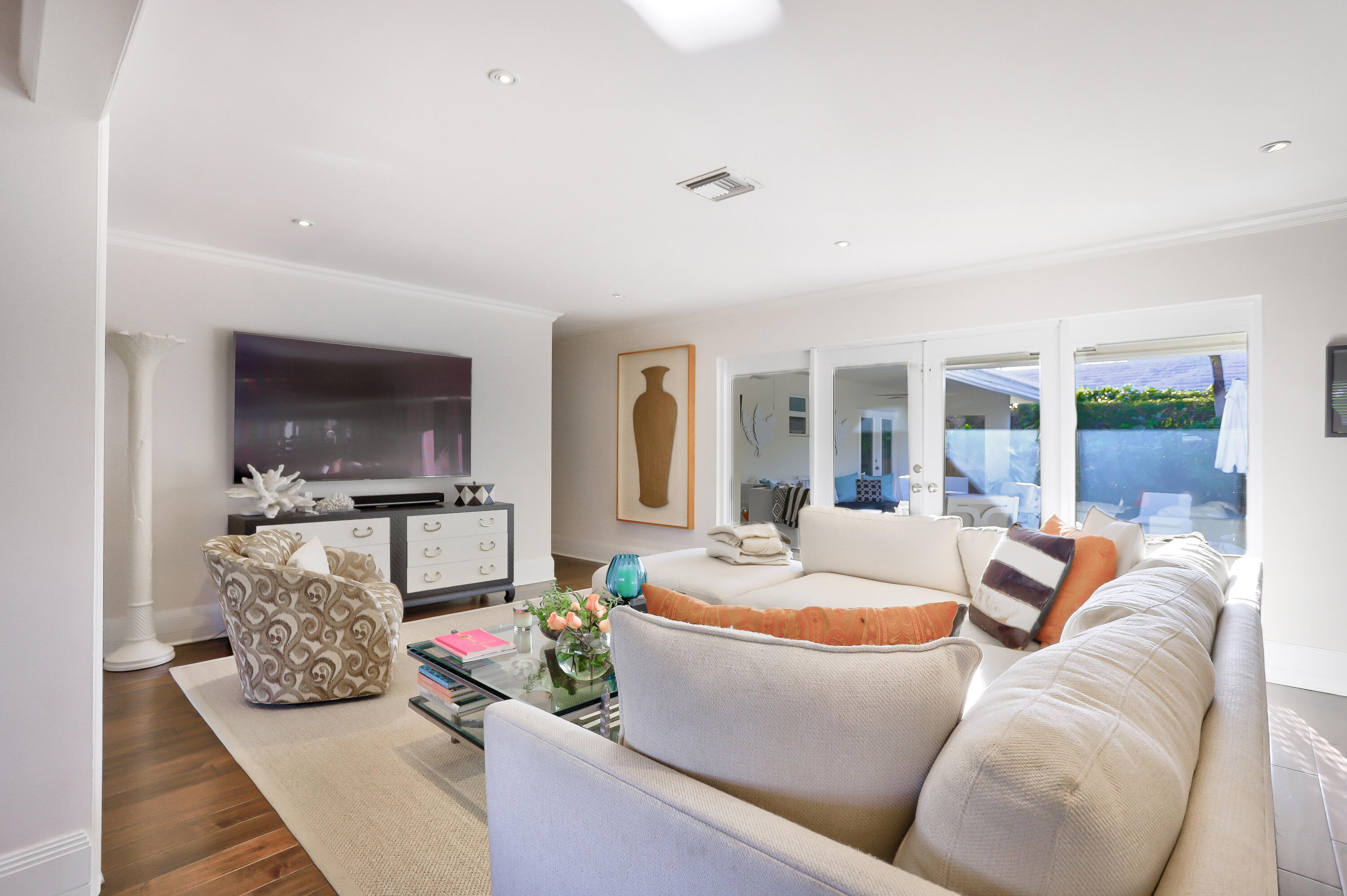 835 Canary Walk Delray Beach, FL 33483 - Photo 24 of 42 a living room with fireplace furniture and a flat screen tv