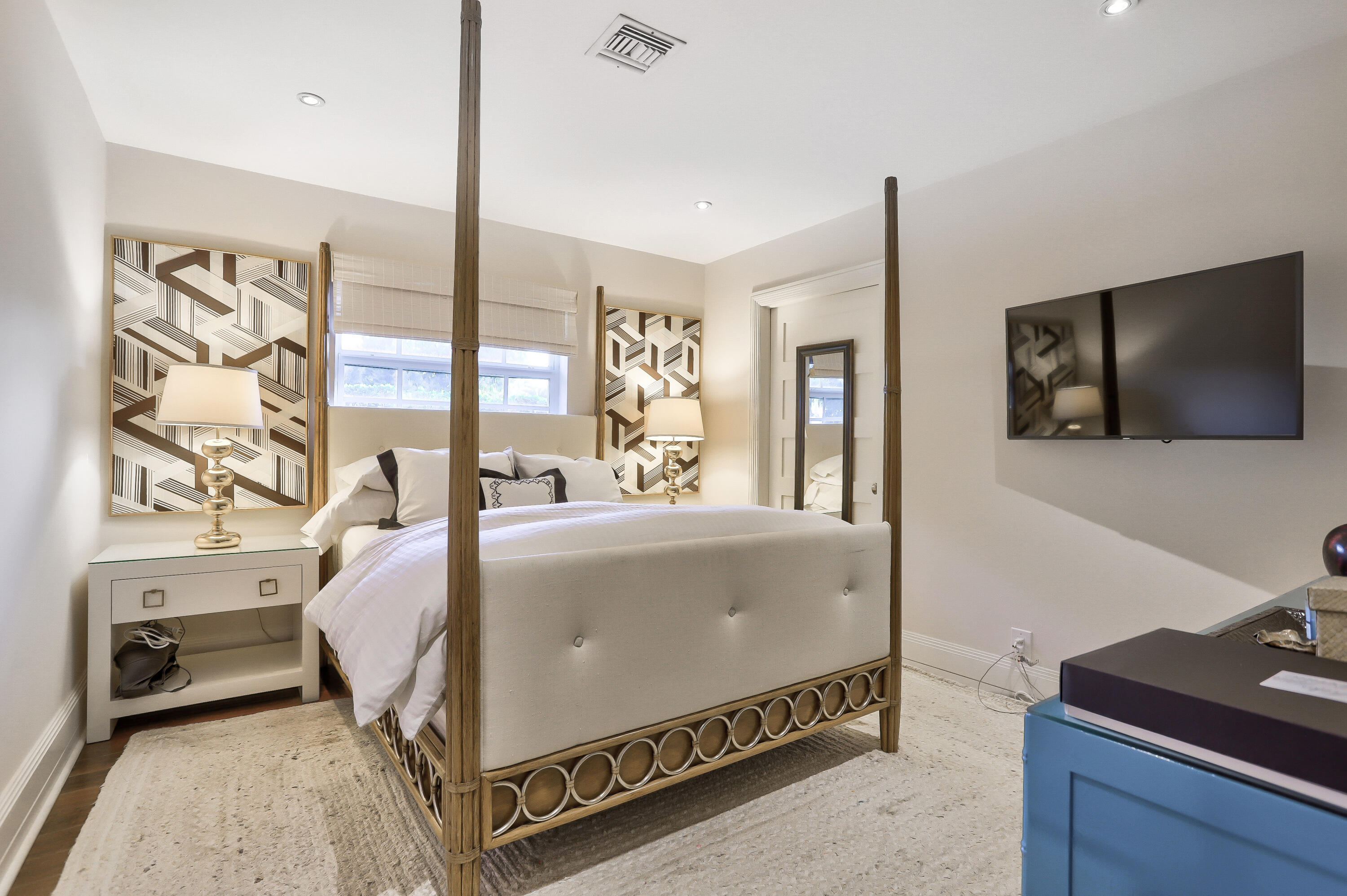 835 Canary Walk Delray Beach, FL 33483 - Photo 29 of 42 a living room with furniture and a flat screen tv