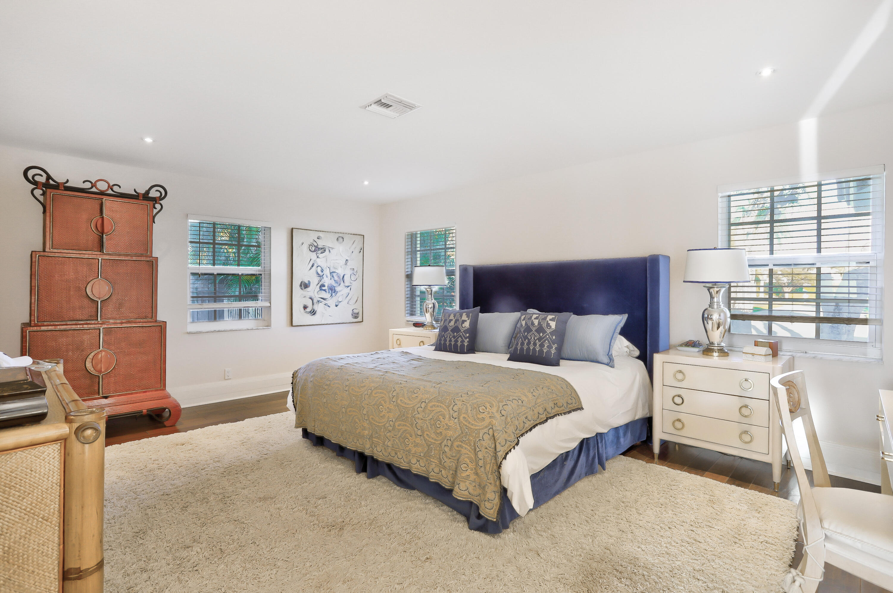 835 Canary Walk Delray Beach, FL 33483 - Photo 35 of 42 a spacious bedroom with a large bed and a window