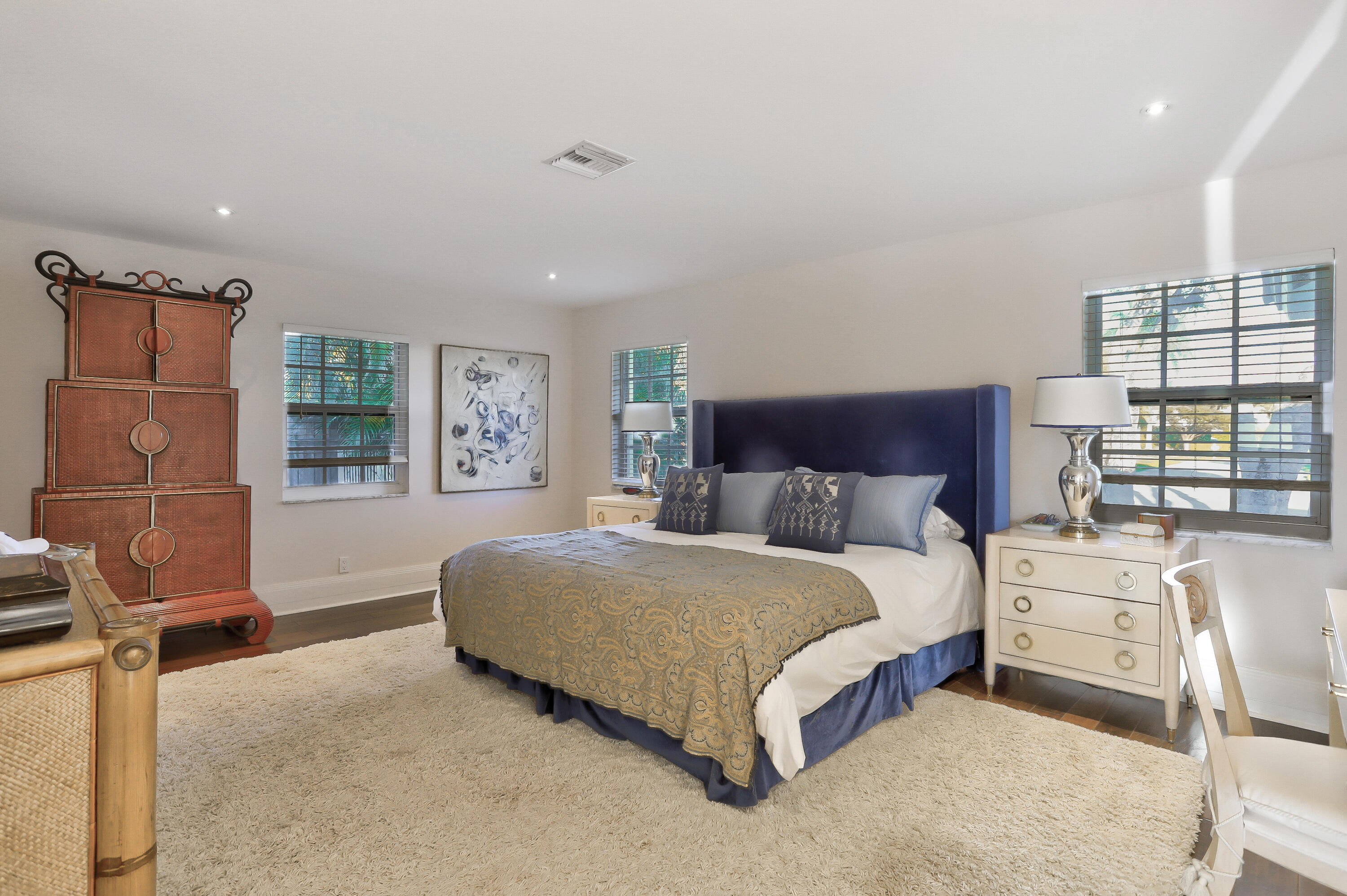 835 Canary Walk Delray Beach, FL 33483 - Photo 36 of 42 a spacious bedroom with a bed and a window