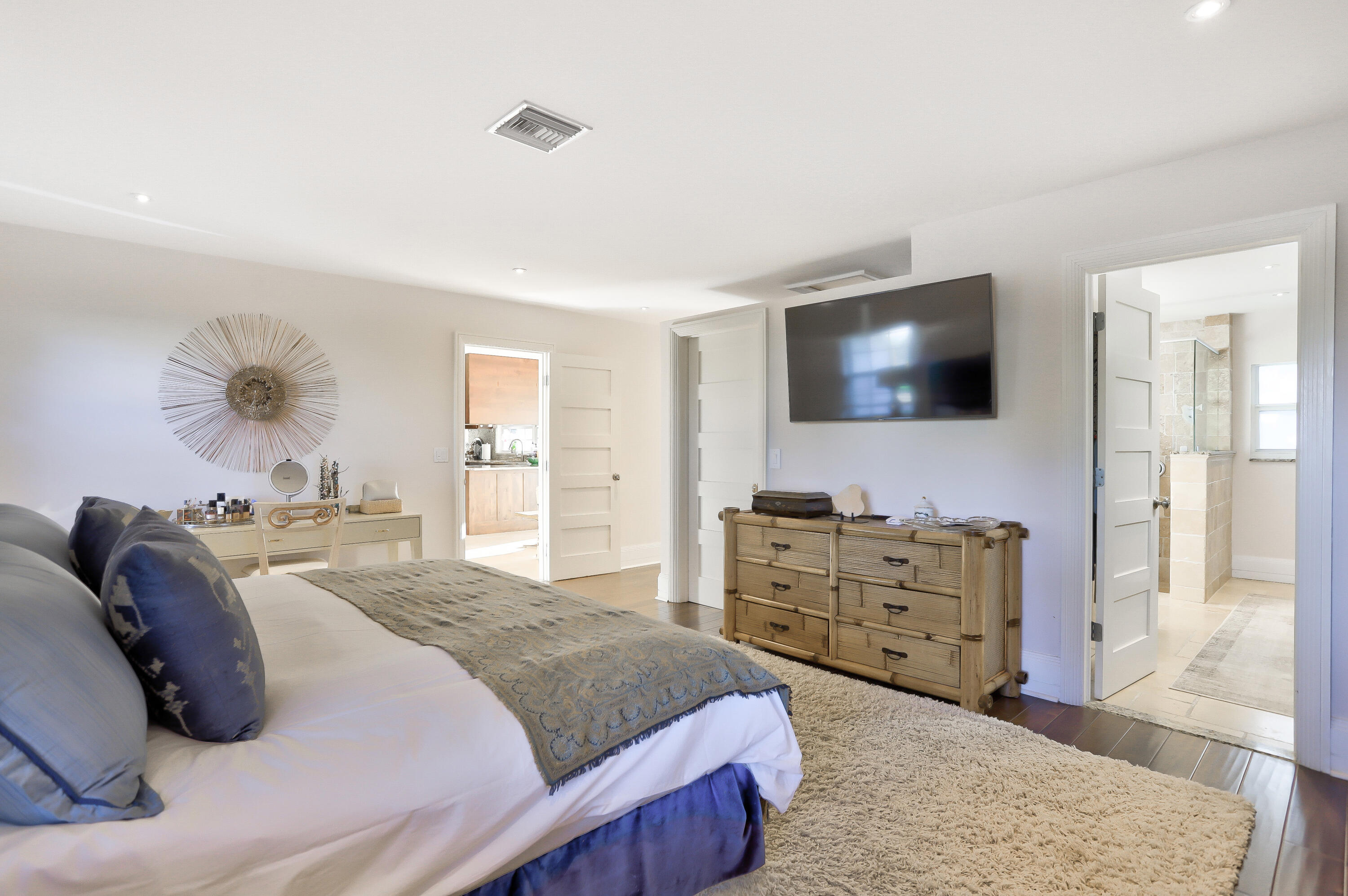 835 Canary Walk Delray Beach, FL 33483 - Photo 37 of 42 a bedroom with a bed and a flat screen tv