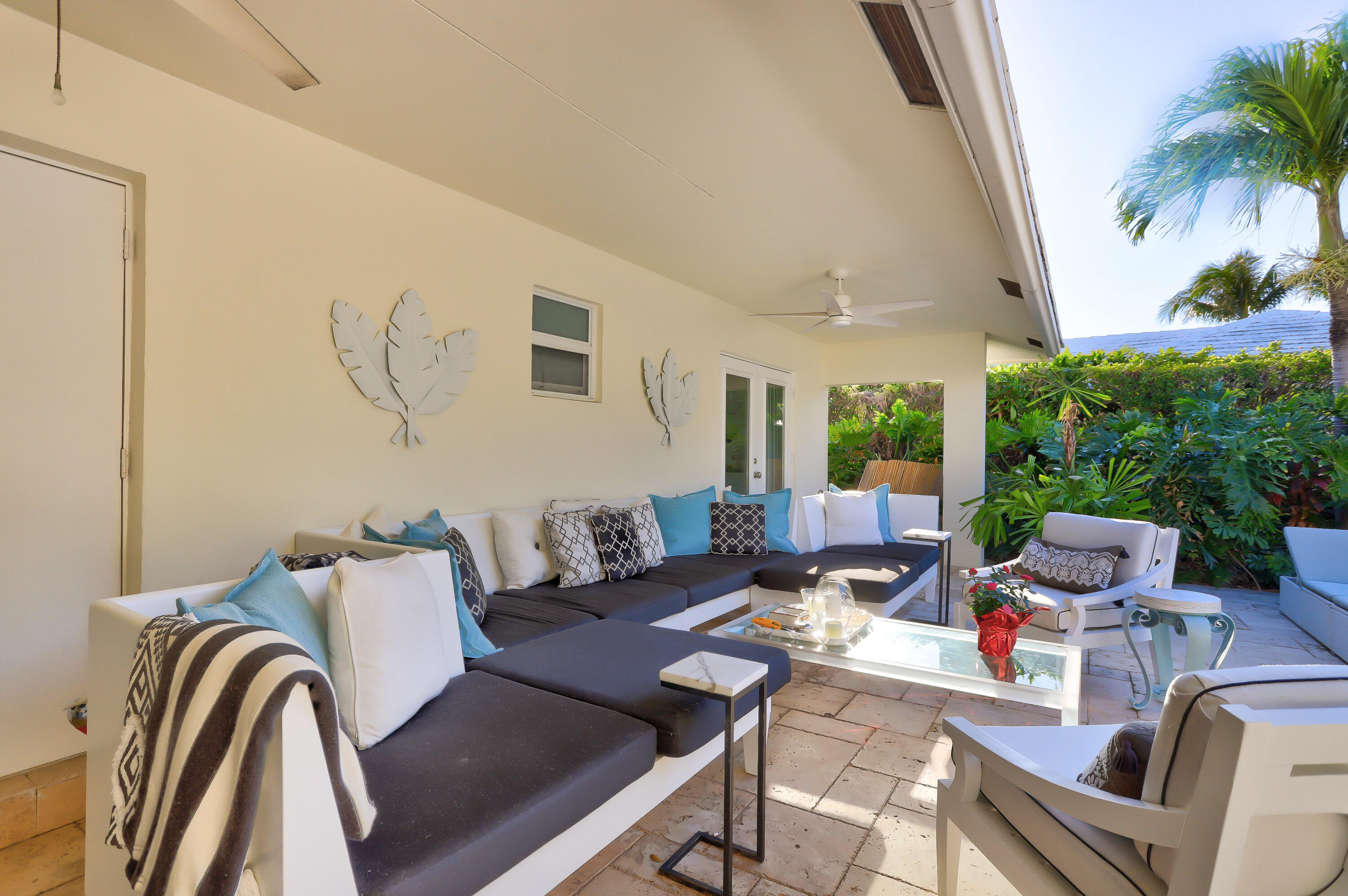 835 Canary Walk Delray Beach, FL 33483 - Photo 7 of 42 a living room with furniture fireplace and a large window